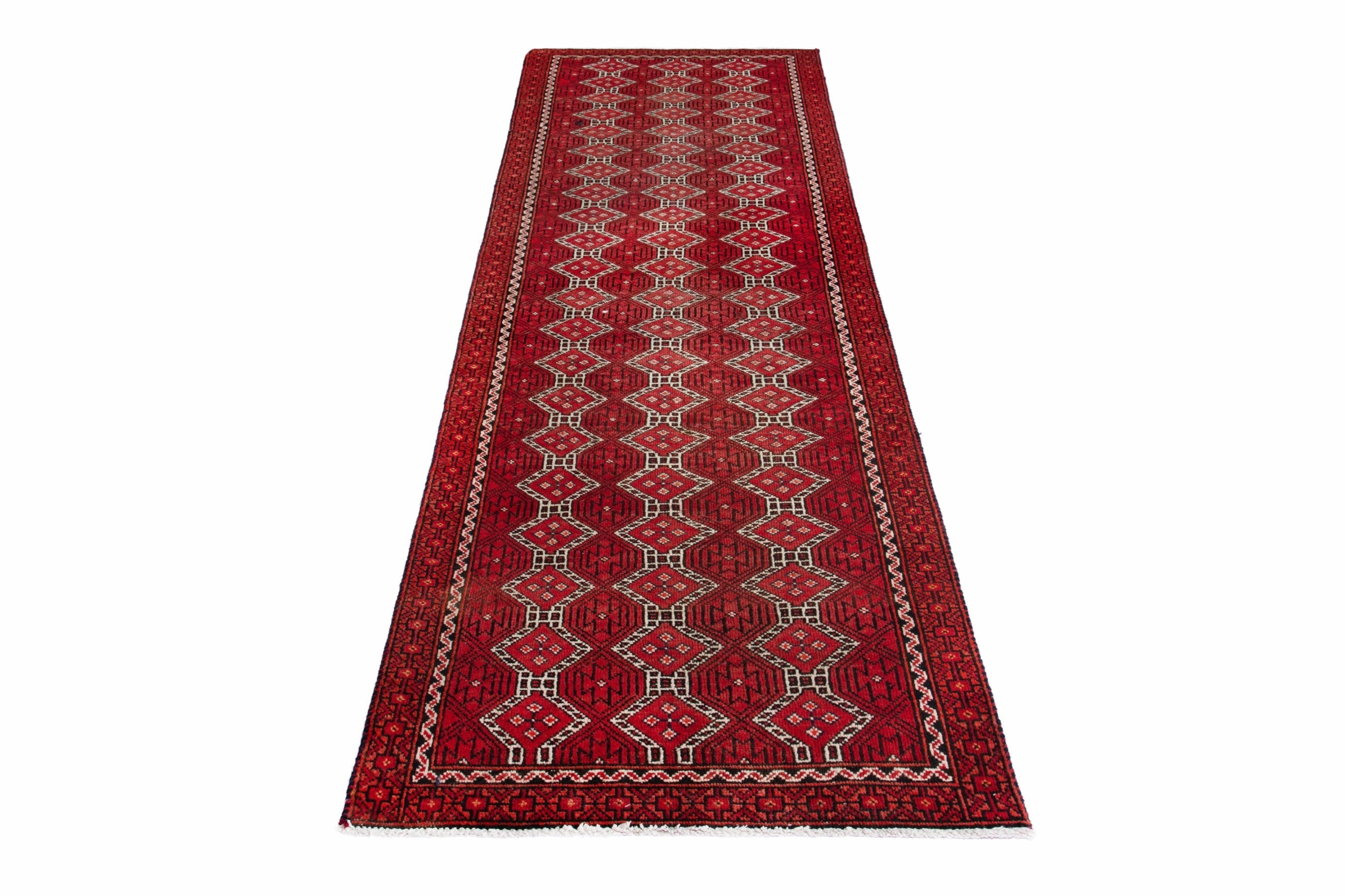 Persian Baluch runner rug in deep red and cream, view 2 of 17