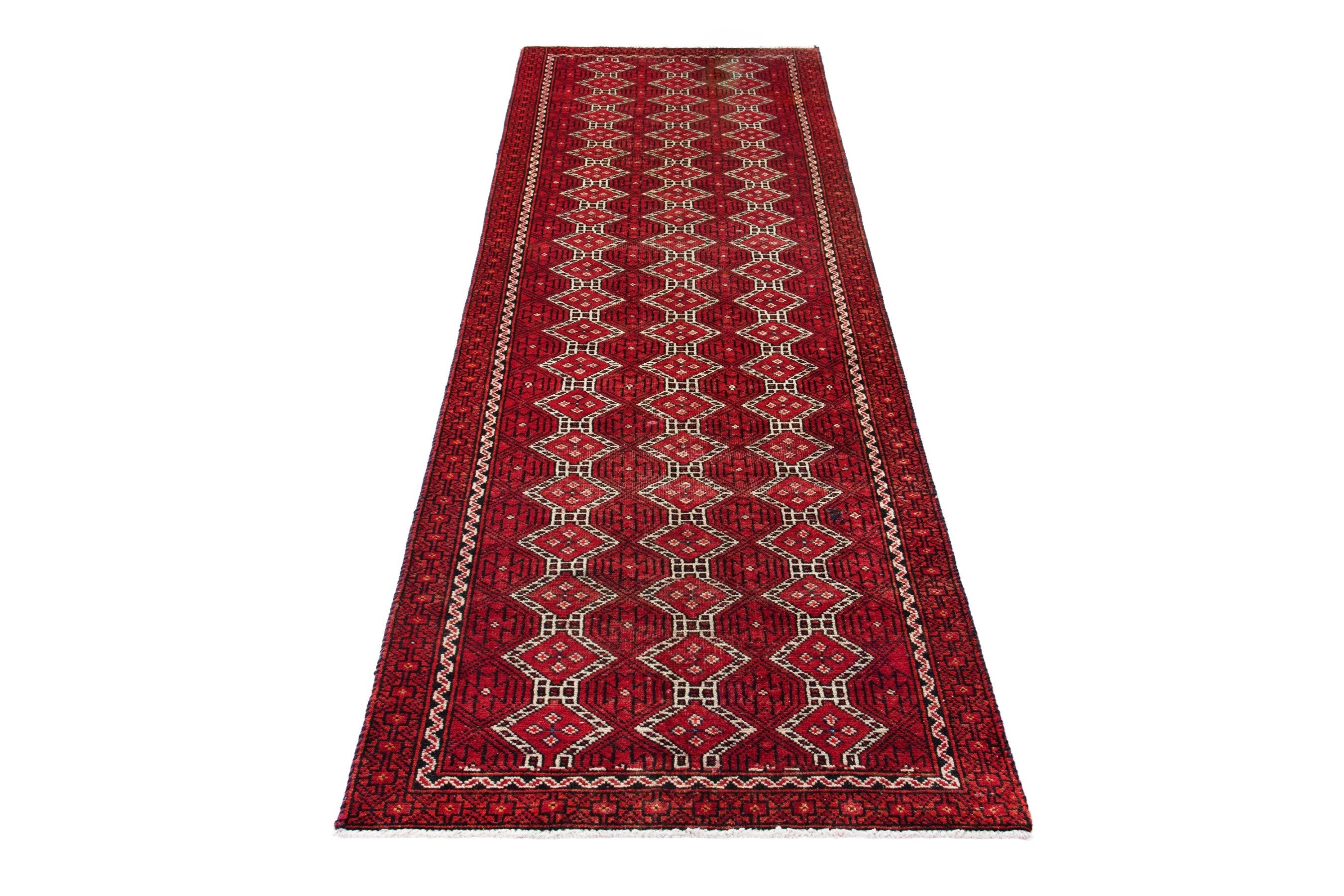 Persian Baluch runner rug in deep red and cream, view 3 of 17