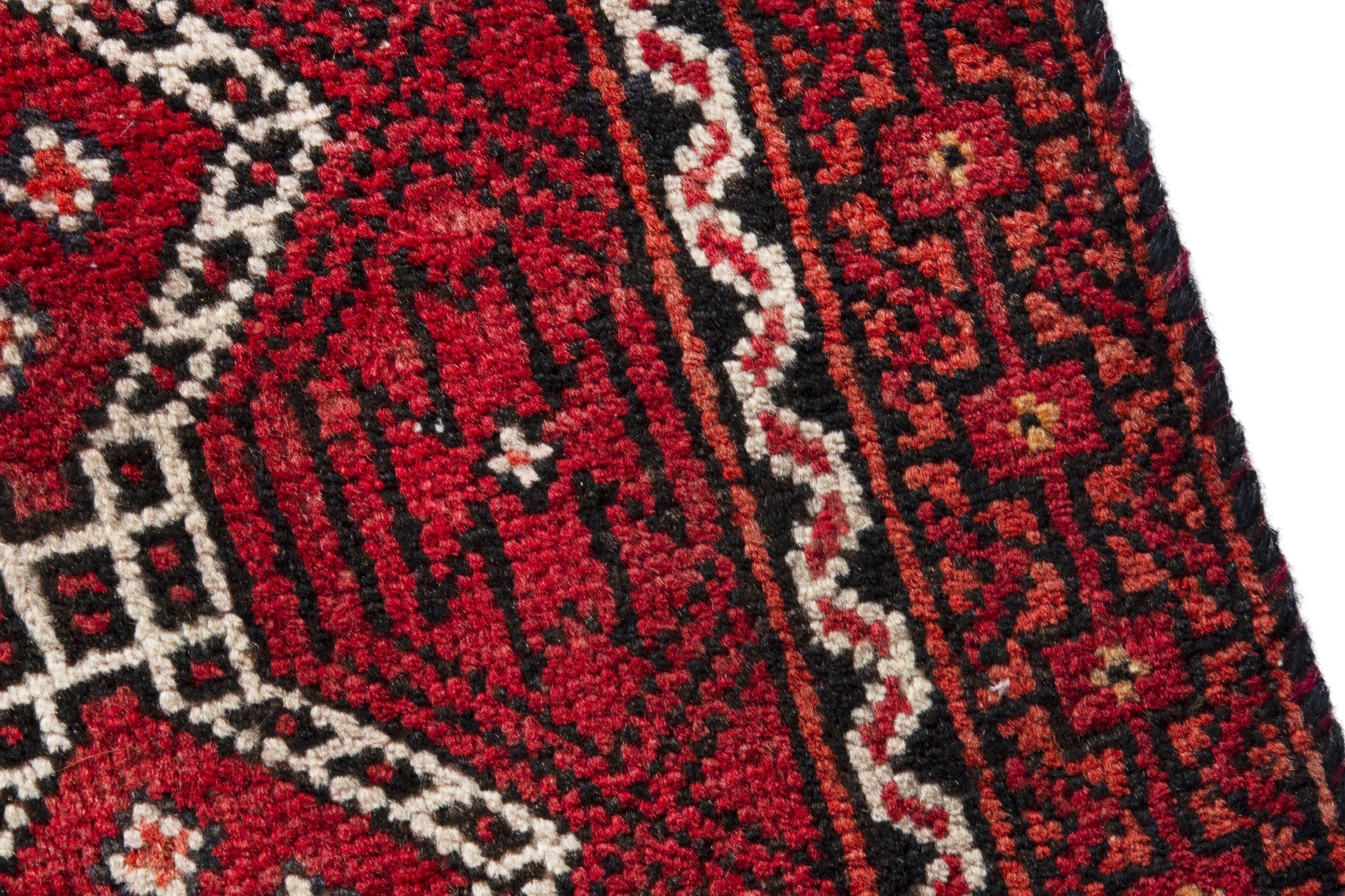 Persian Baluch runner rug in deep red and cream, view 7 of 17