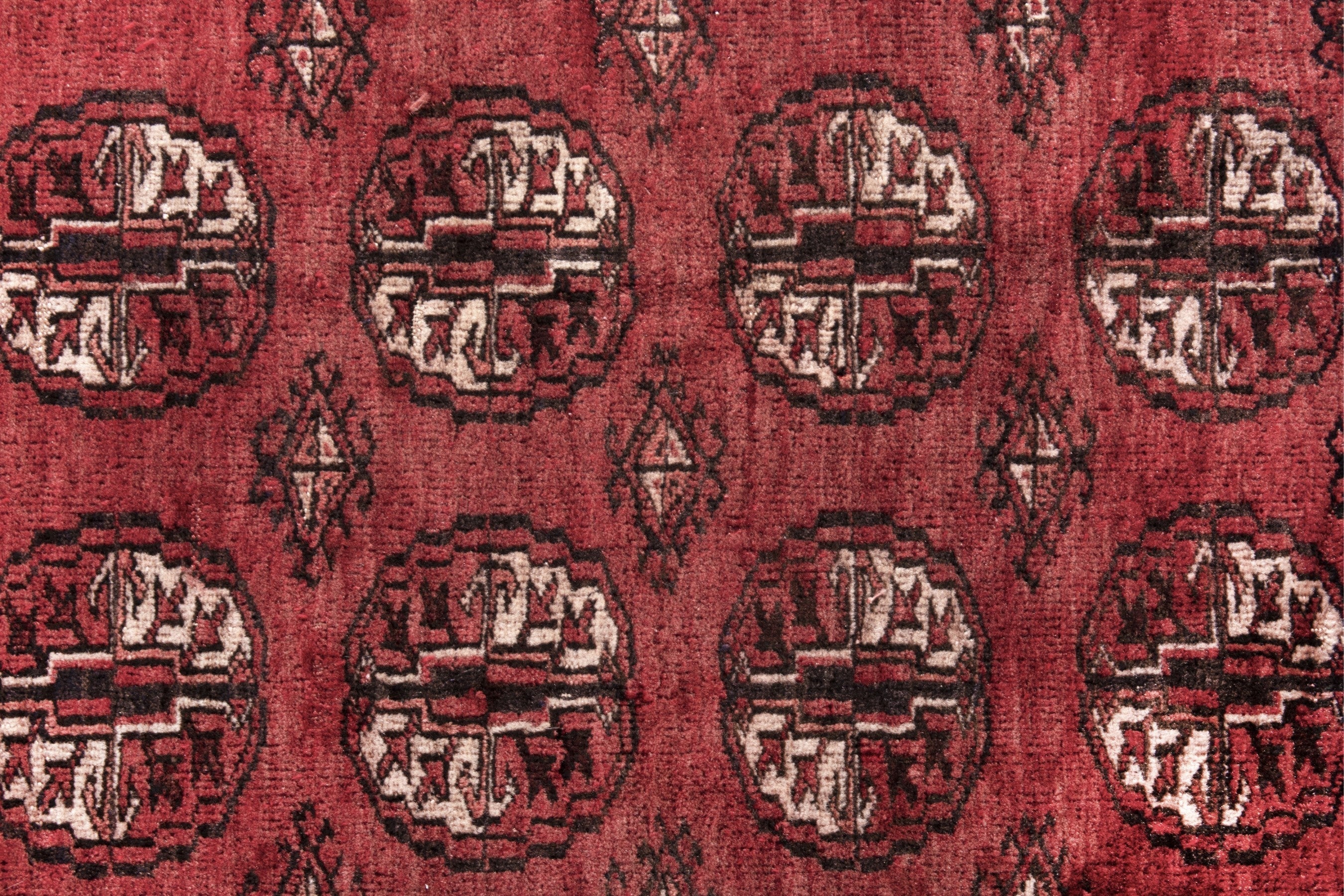 Persian Torkaman accent rug in deep red and faded red, view 10 of 17