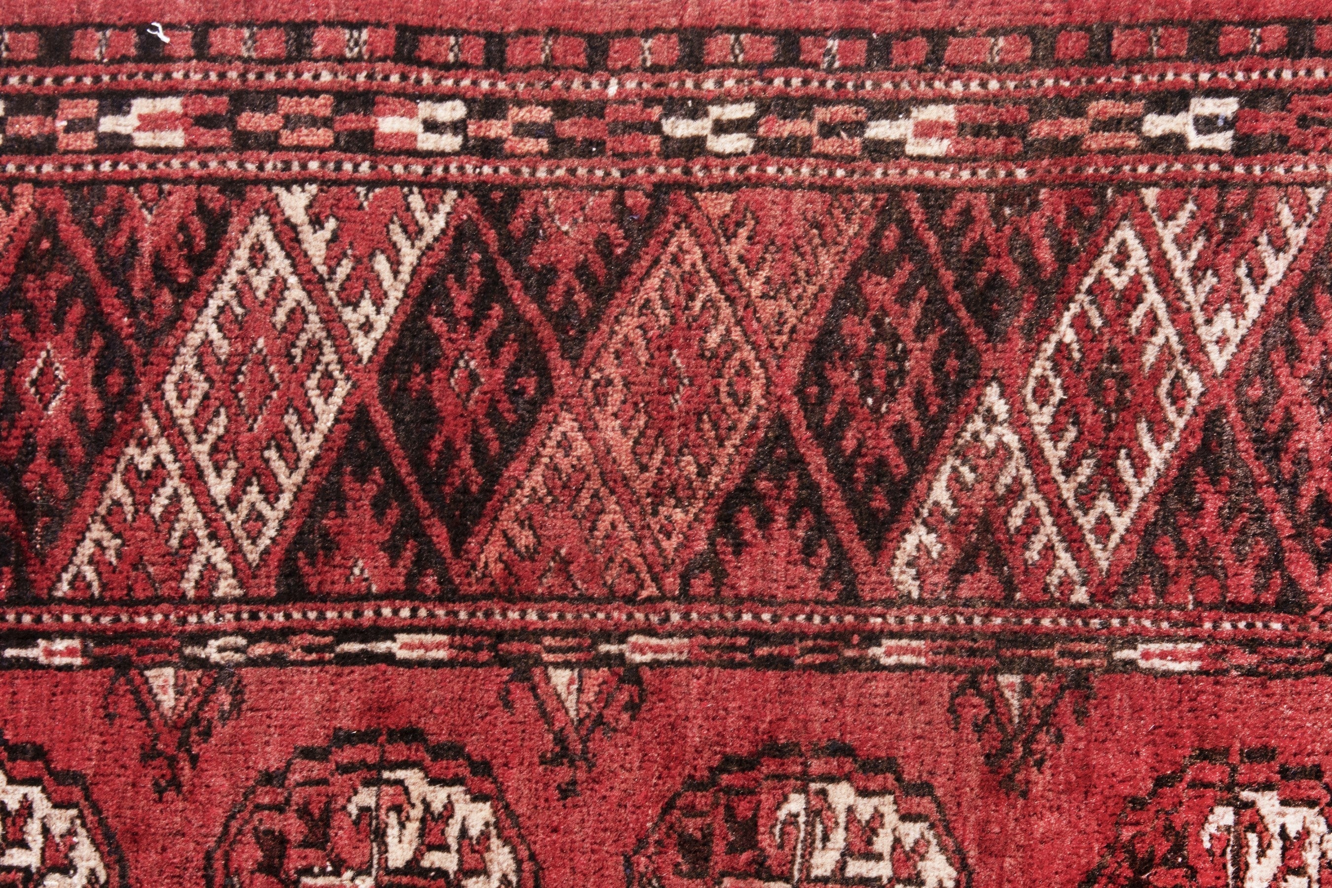 Persian Torkaman accent rug in deep red and faded red, view 12 of 17