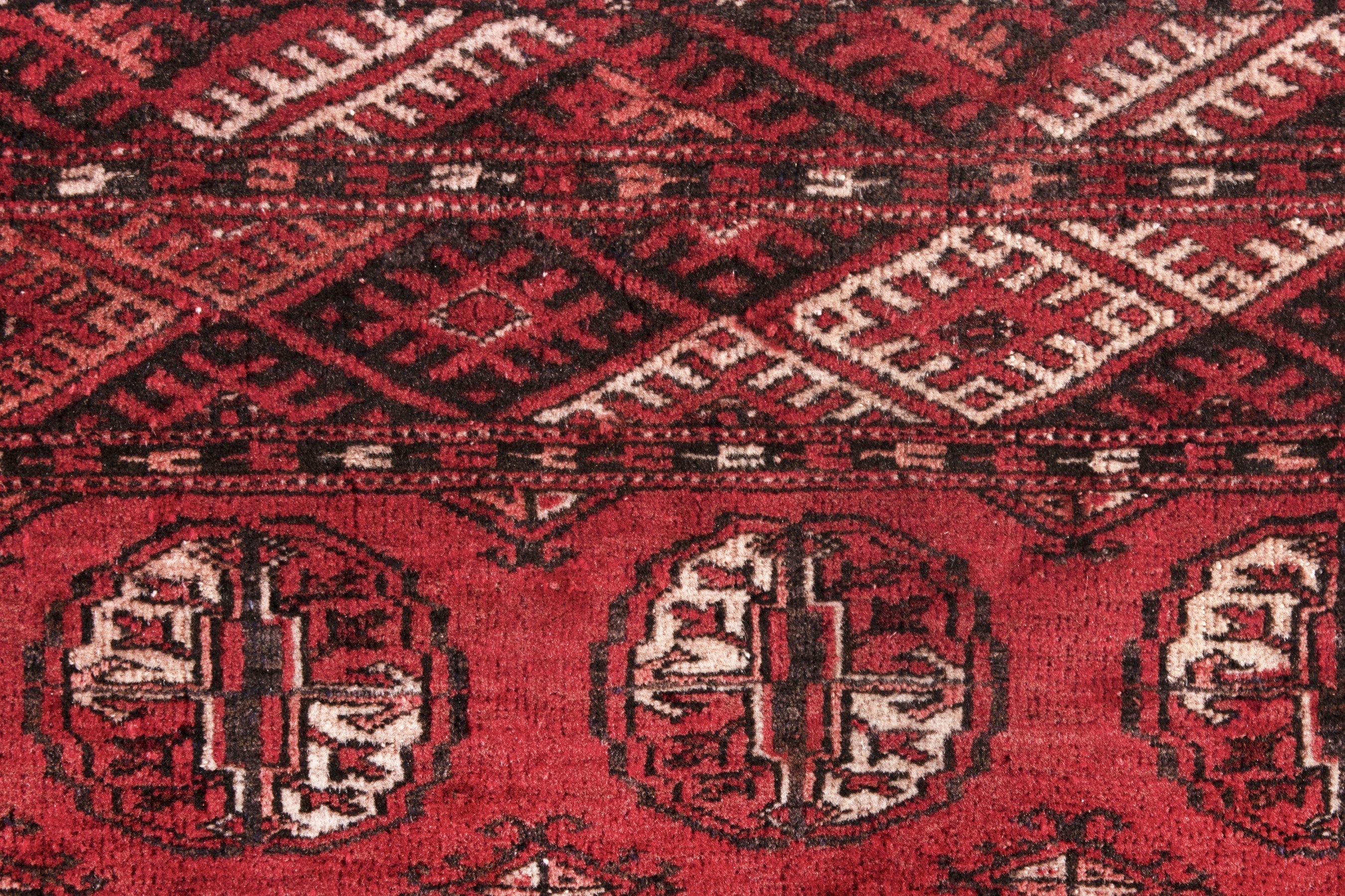 Persian Torkaman accent rug in deep red and faded red, view 13 of 17