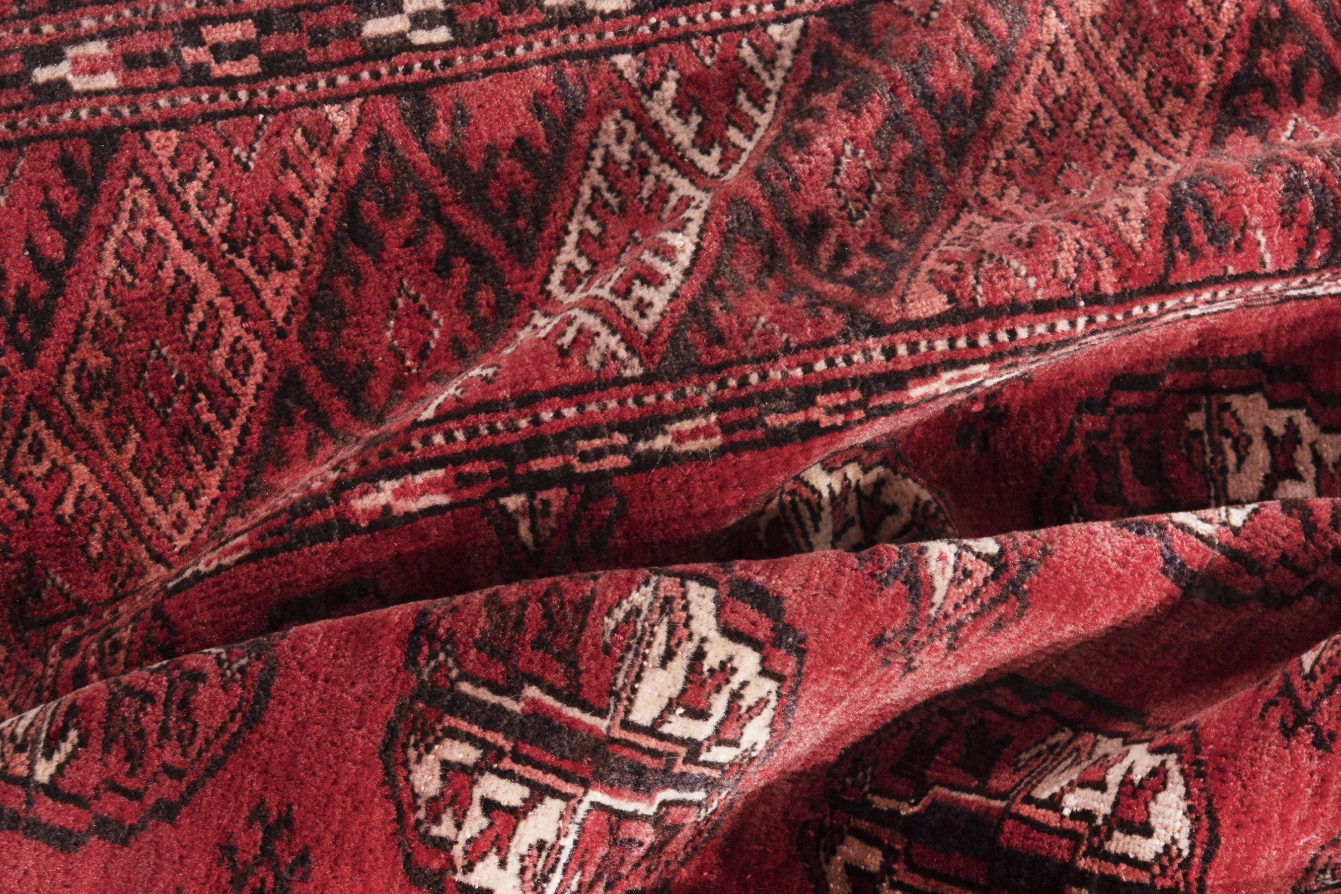 Persian Torkaman accent rug in deep red and faded red, view 15 of 17