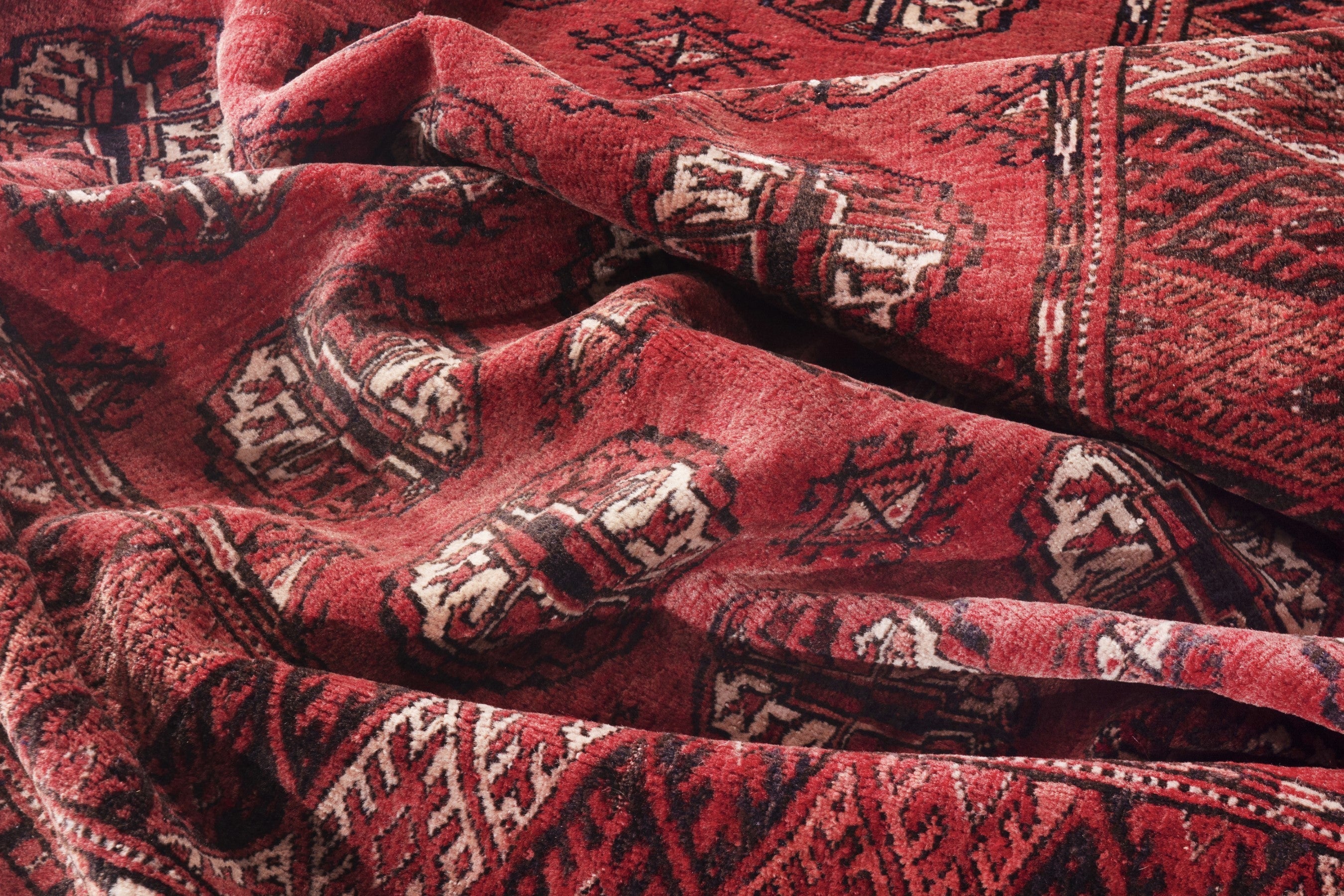 Persian Torkaman accent rug in deep red and faded red, view 16 of 17