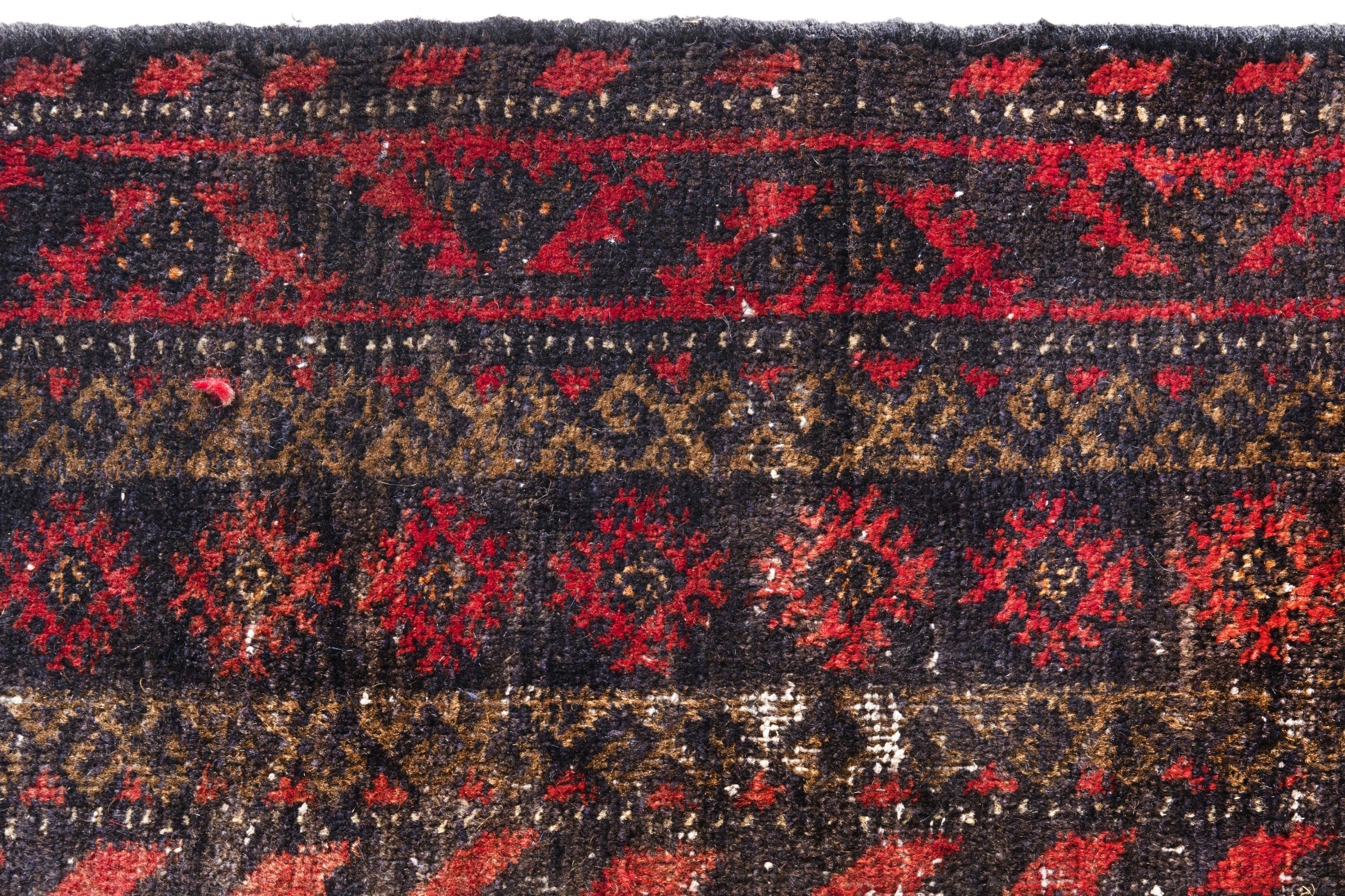 Persian Baluch accent rug in deep red and cream, view 13 of 19
