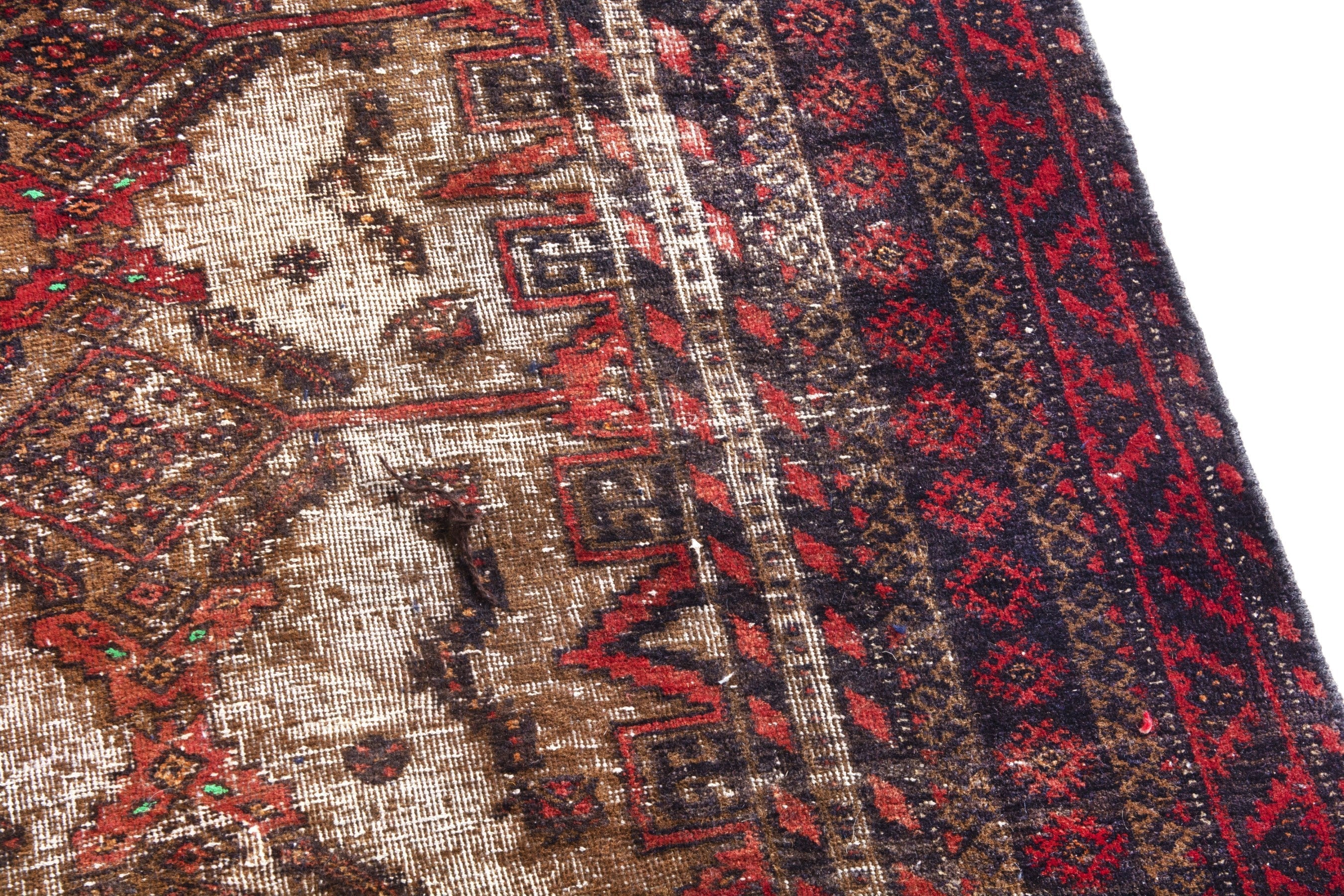 Persian Baluch accent rug in deep red and cream, view 7 of 19
