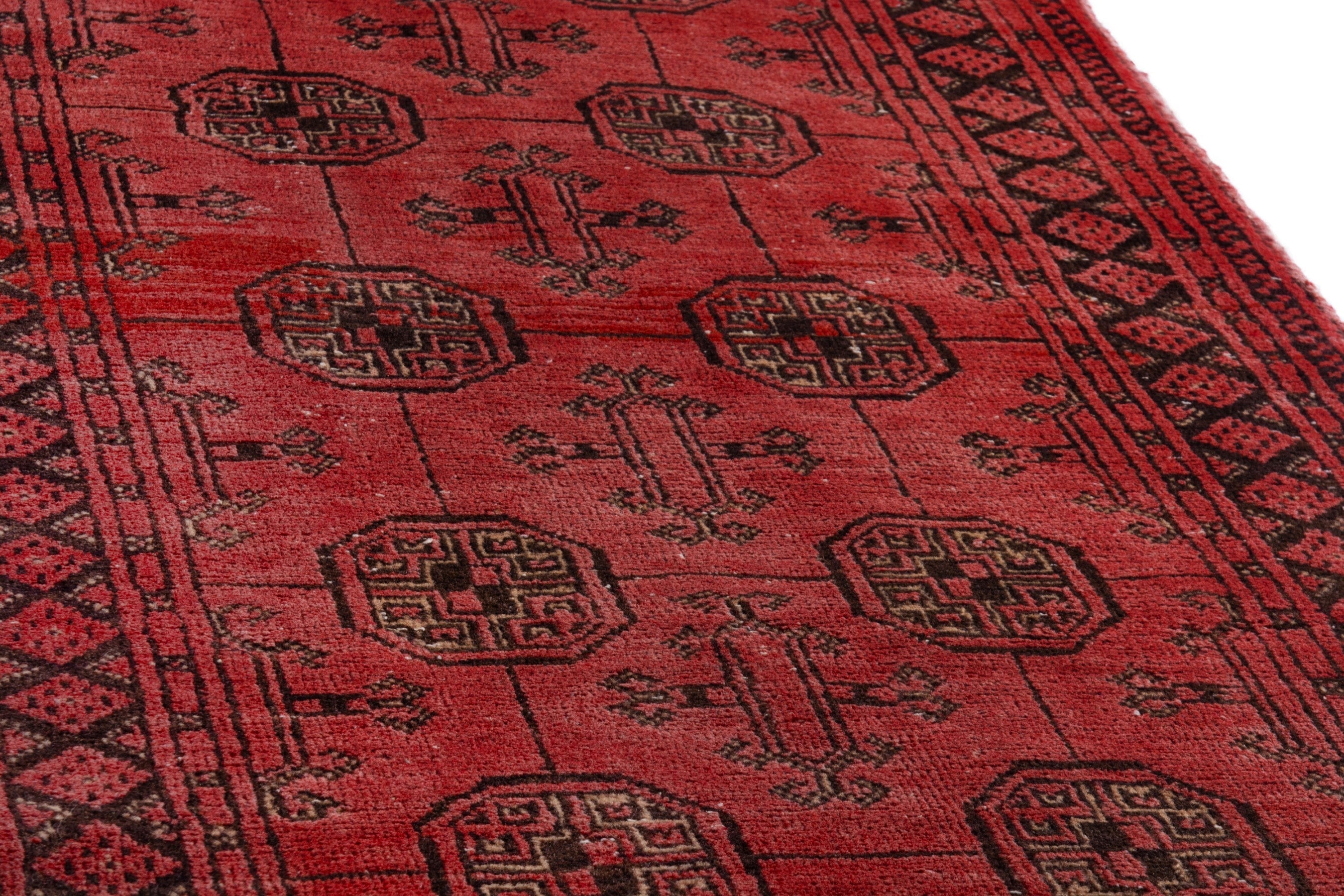 Persian Torkaman runner rug in deep red and charcoal, view 11 of 20