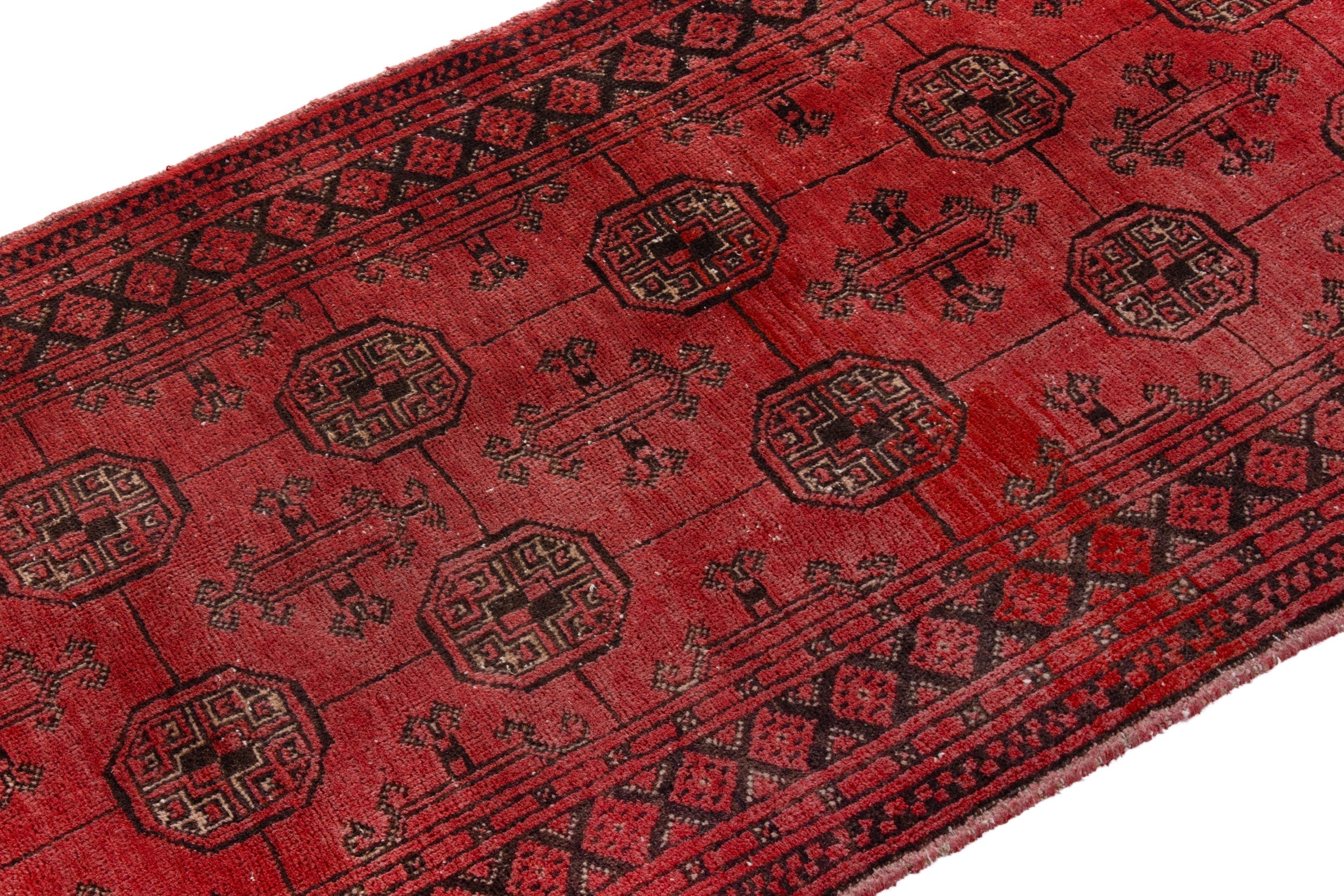 Persian Torkaman runner rug in deep red and charcoal, view 6 of 20