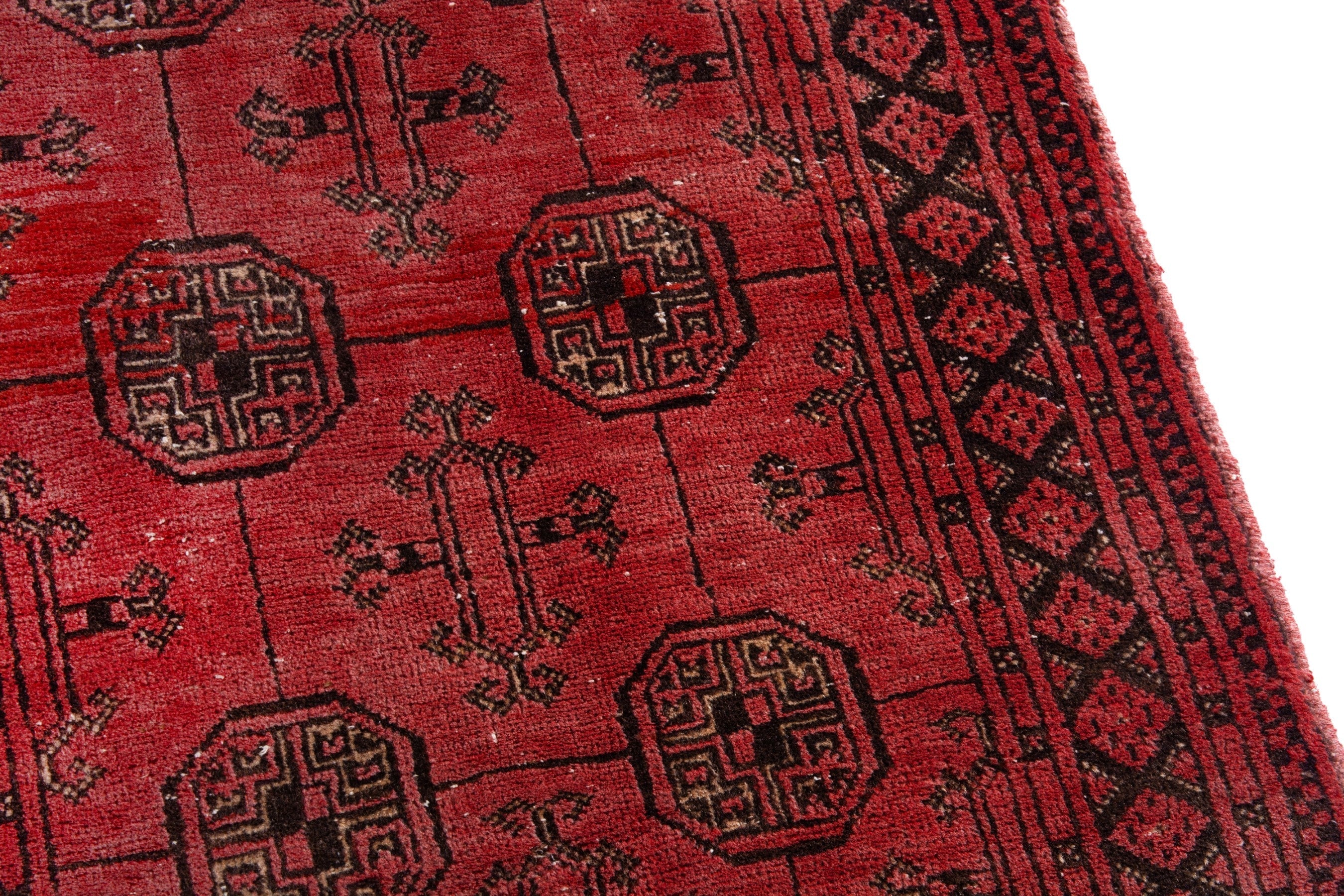 Persian Torkaman runner rug in deep red and charcoal, view 7 of 20