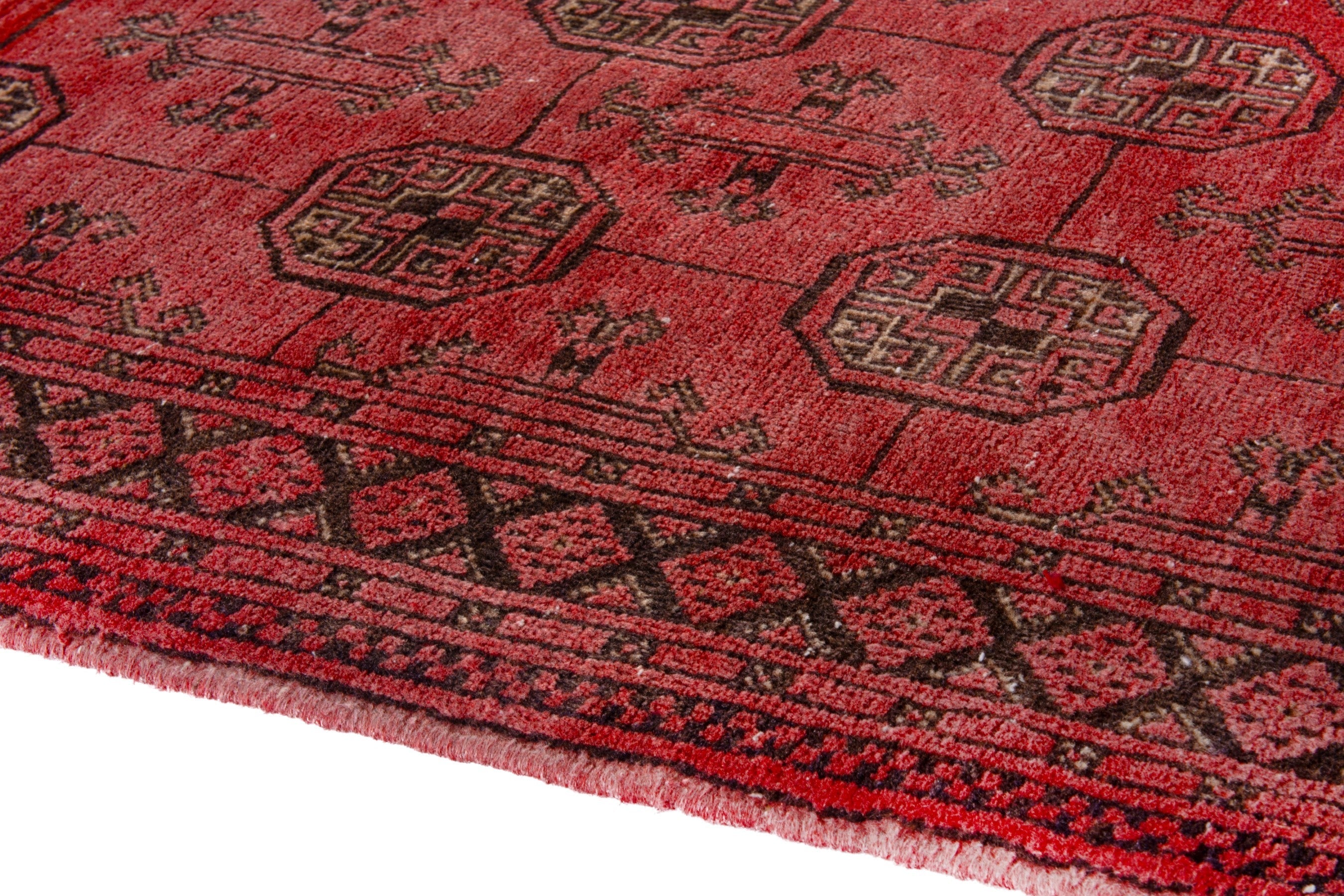 Persian Torkaman runner rug in deep red and charcoal, view 8 of 20