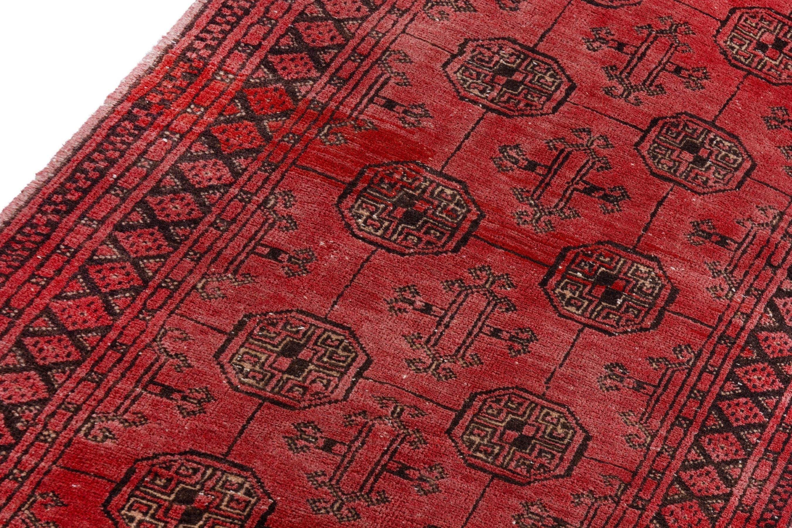 Persian Torkaman runner rug in deep red and charcoal, view 9 of 20