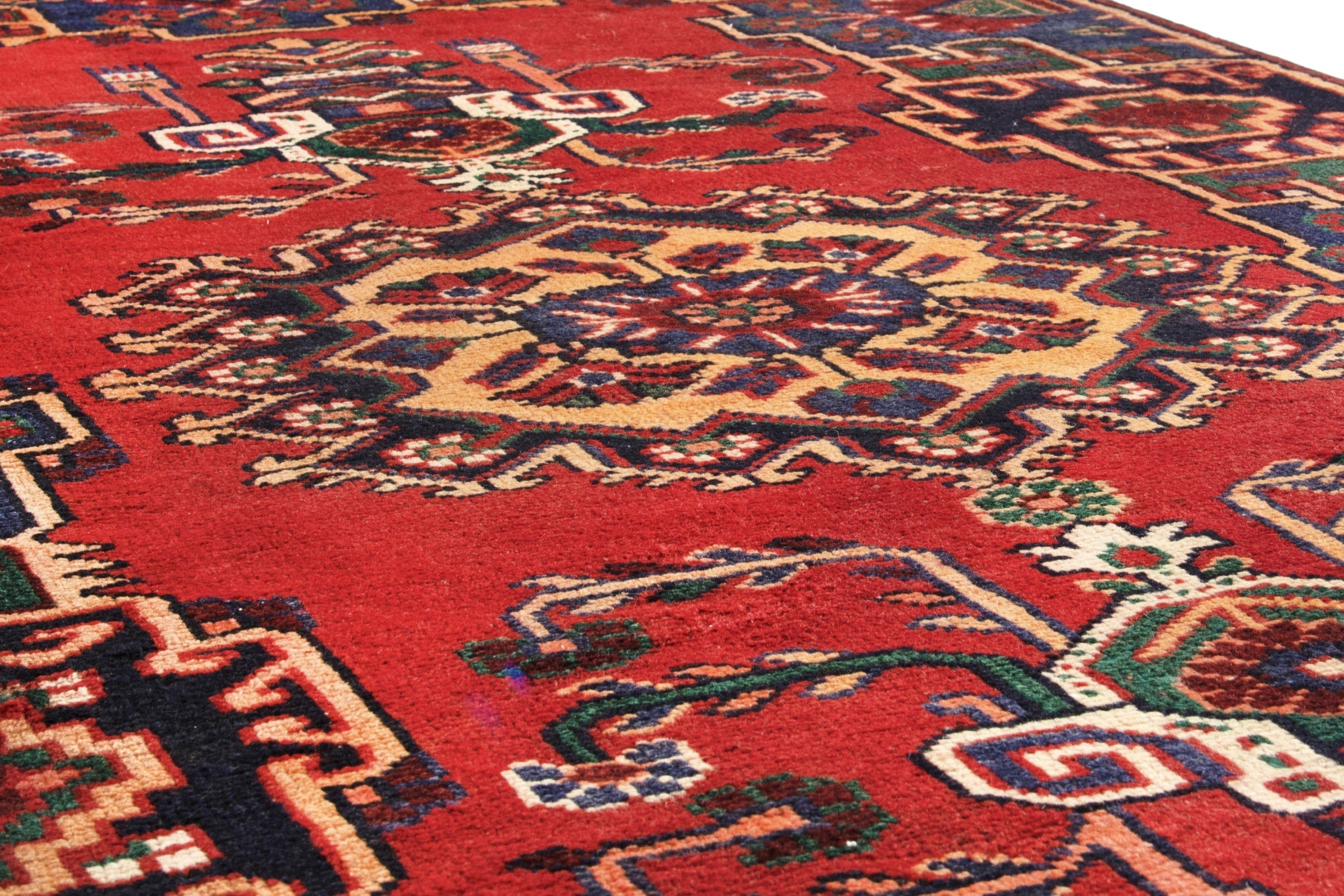 Persian Ferdos area rug in deep red and navy, view 10 of 17