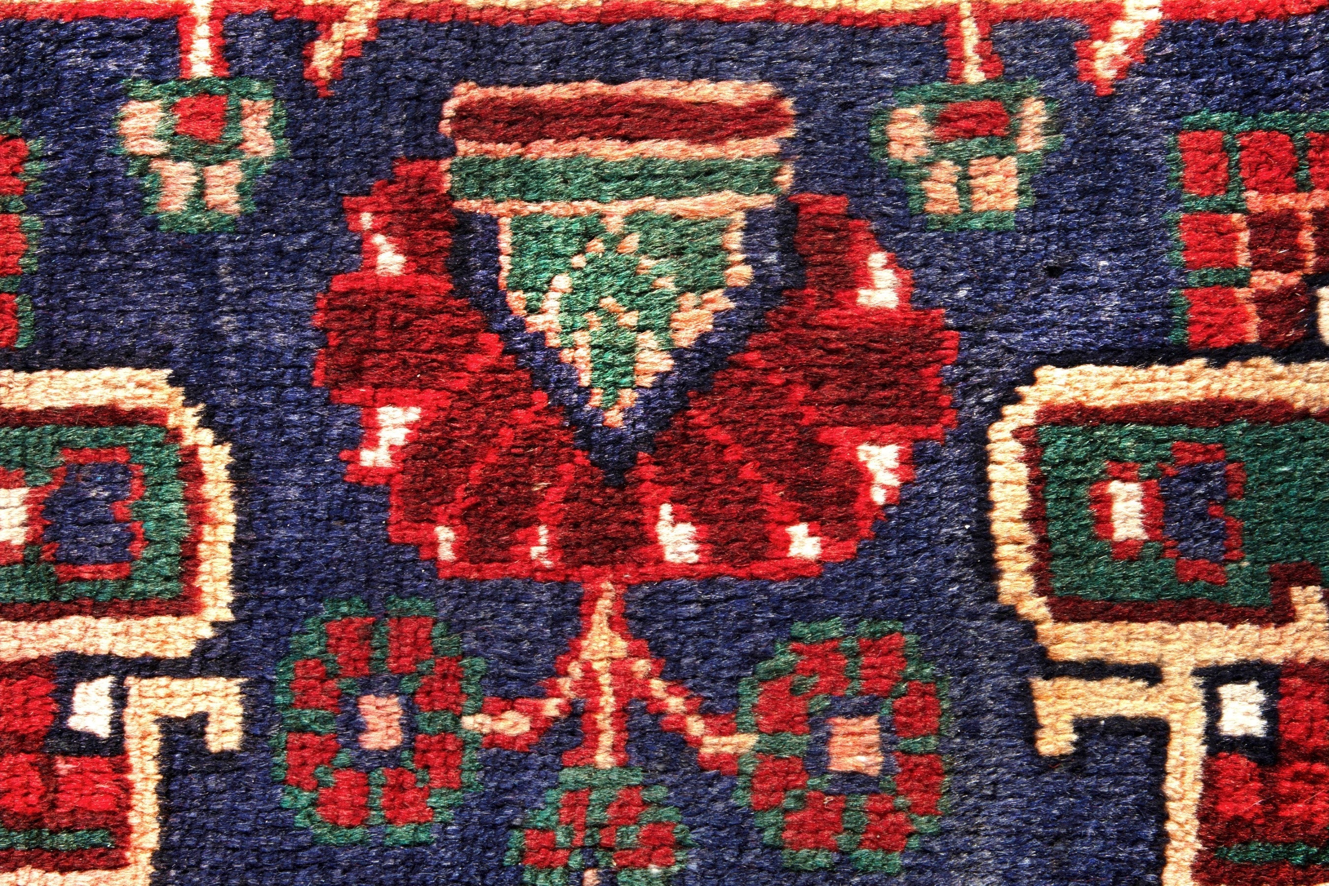 Persian Ferdos area rug in deep red and navy, view 13 of 17