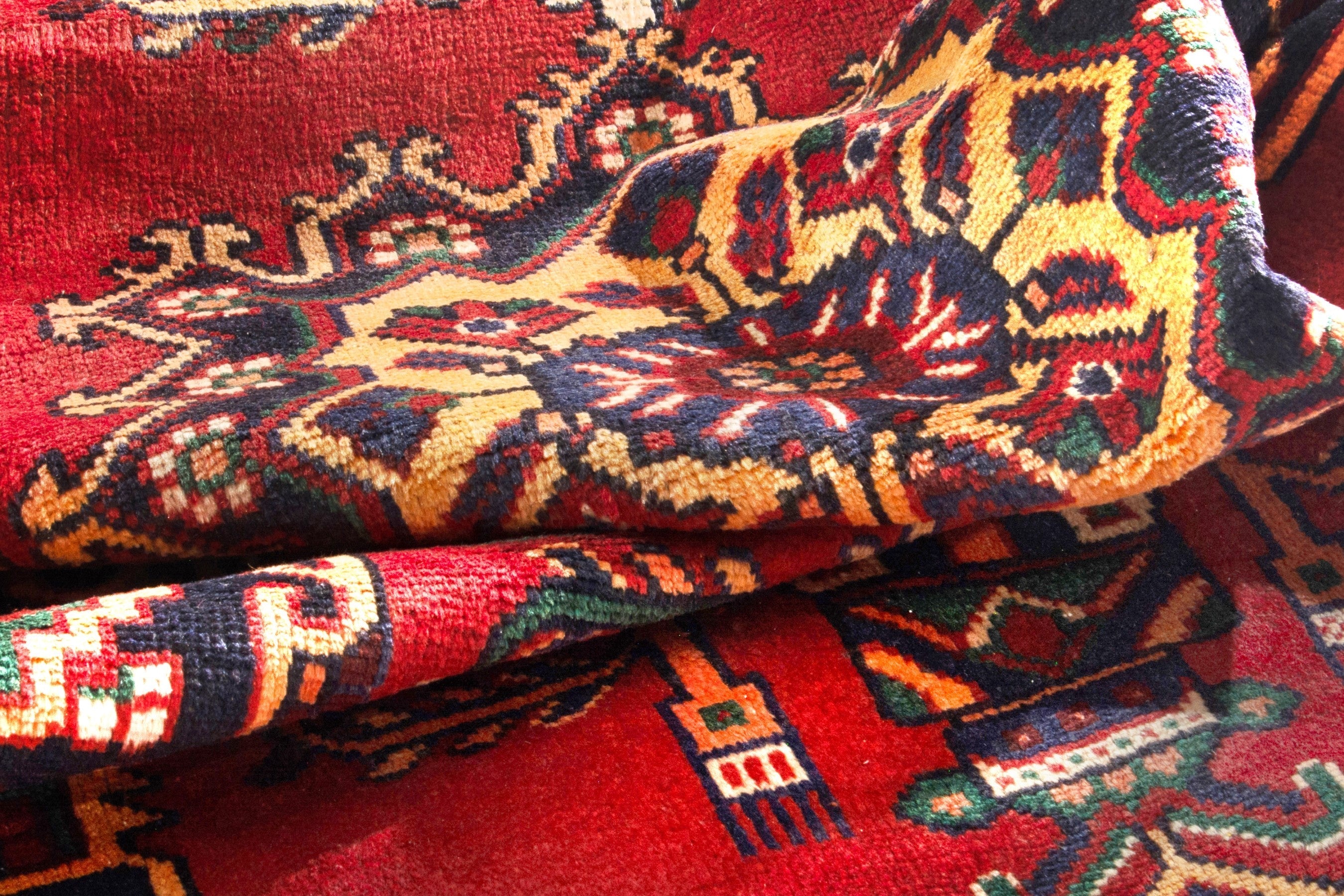 Persian Ferdos area rug in deep red and navy, view 15 of 17