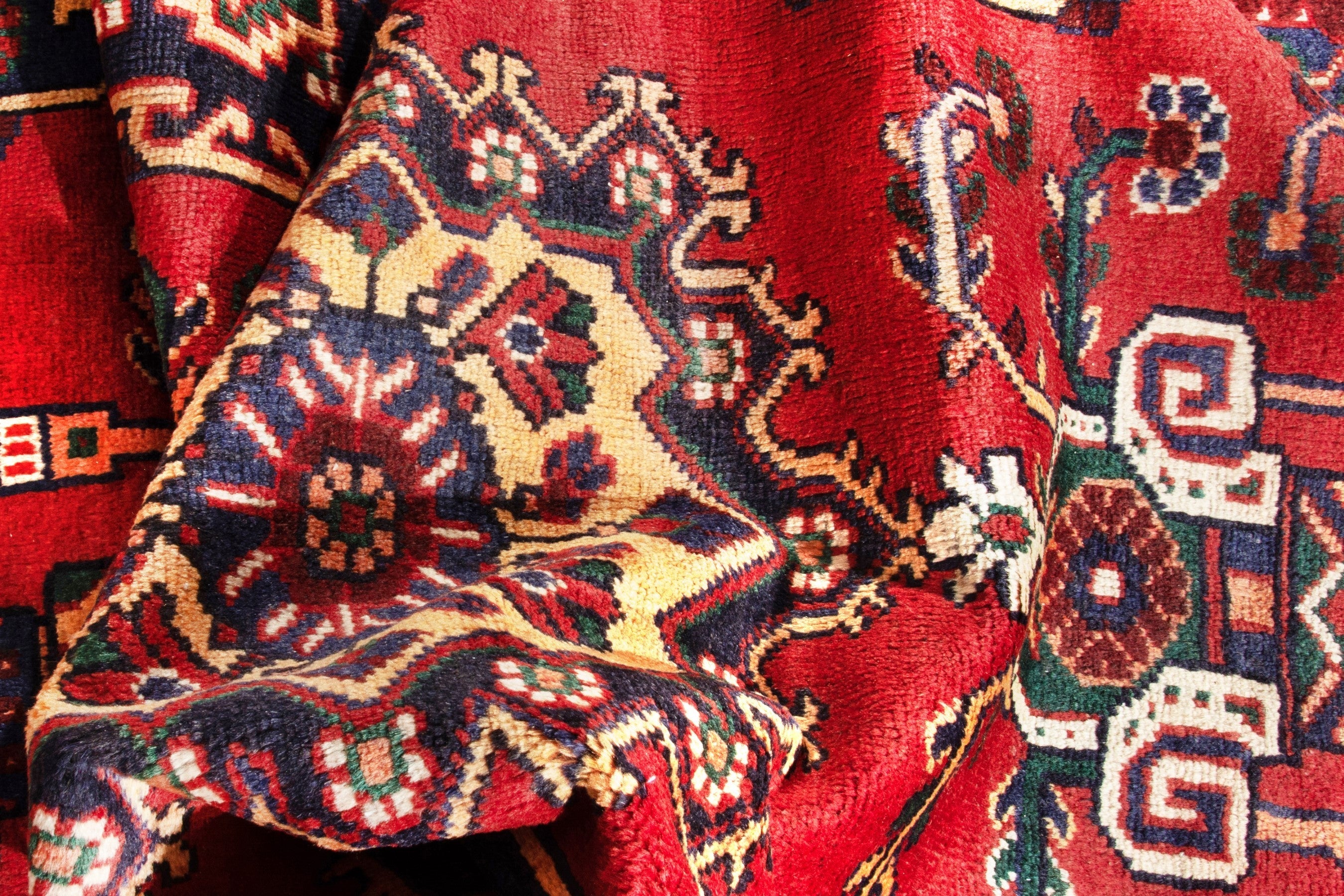 Persian Ferdos area rug in deep red and navy, view 16 of 17