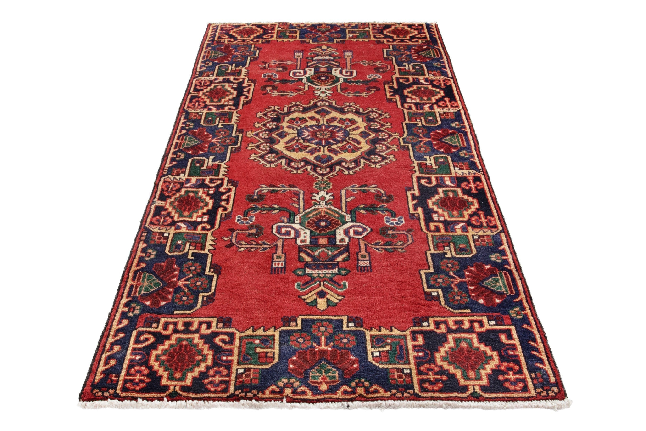 Persian Ferdos area rug in deep red and navy, view 2 of 17