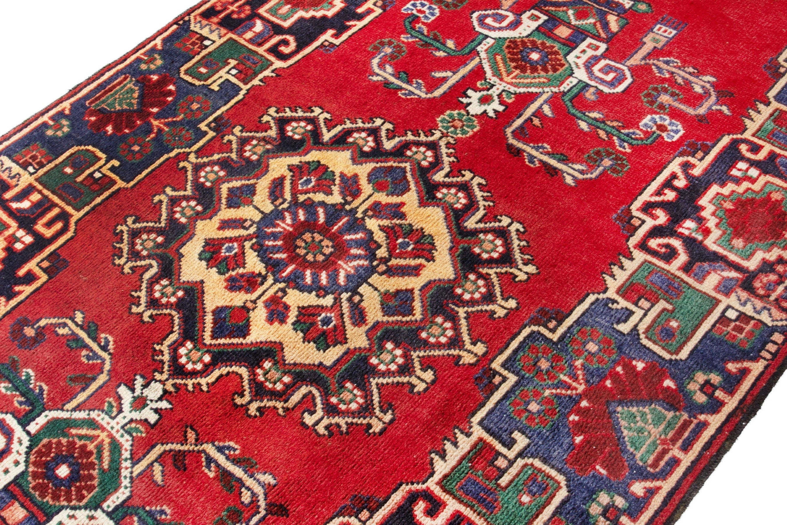 Persian Ferdos area rug in deep red and navy, view 6 of 17