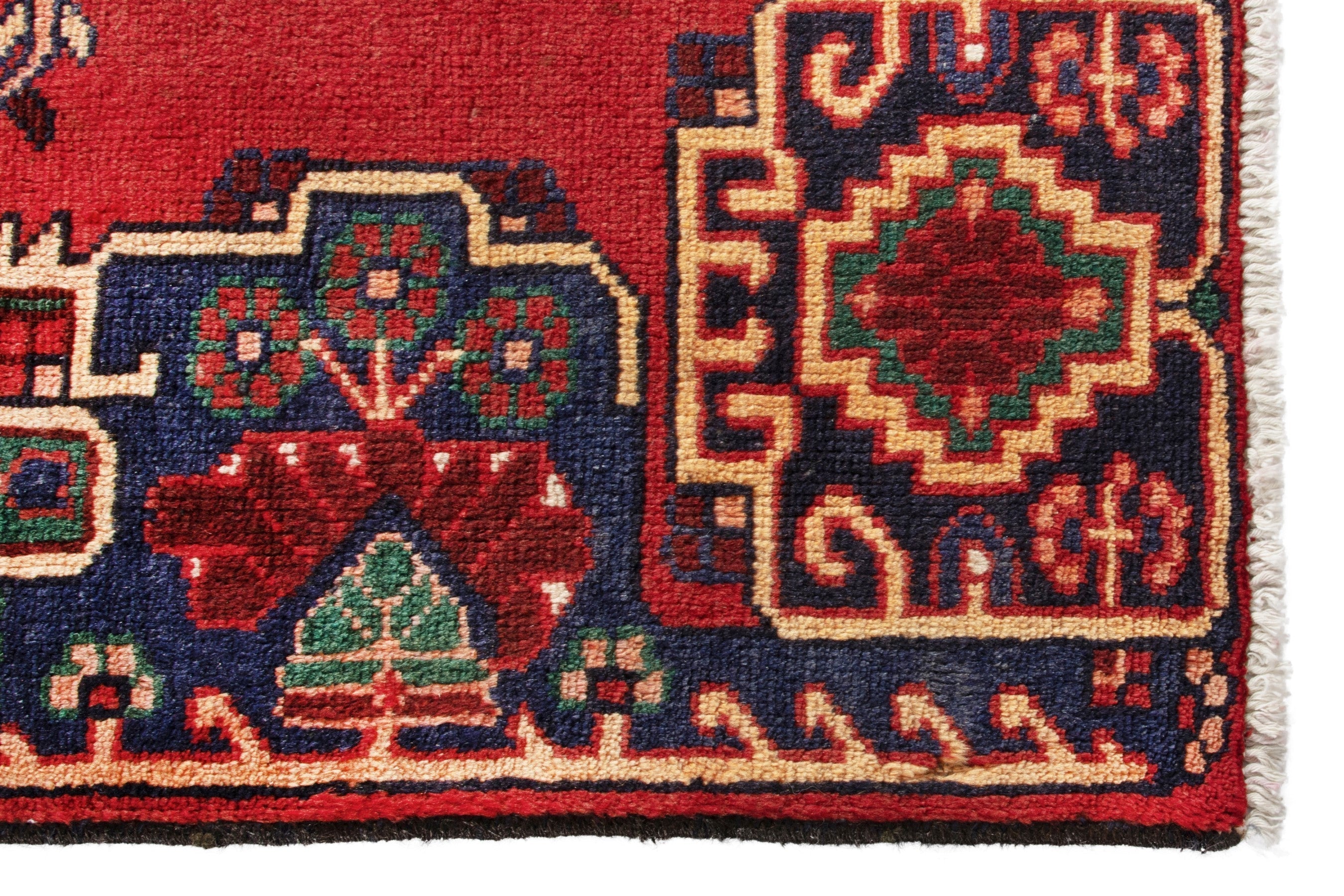 Persian Ferdos area rug in deep red and navy, view 5 of 17