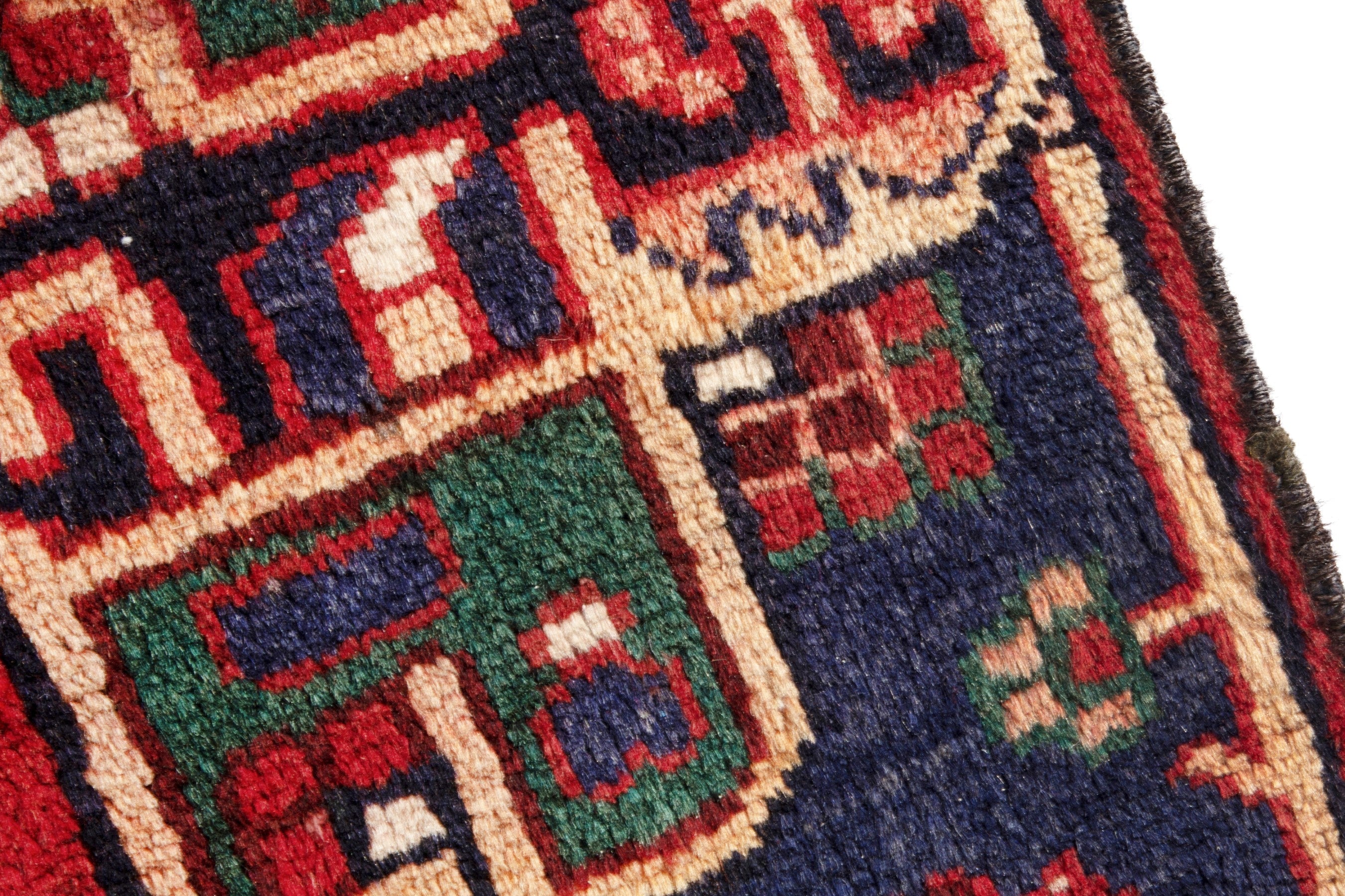 Persian Ferdos area rug in deep red and navy, view 7 of 17