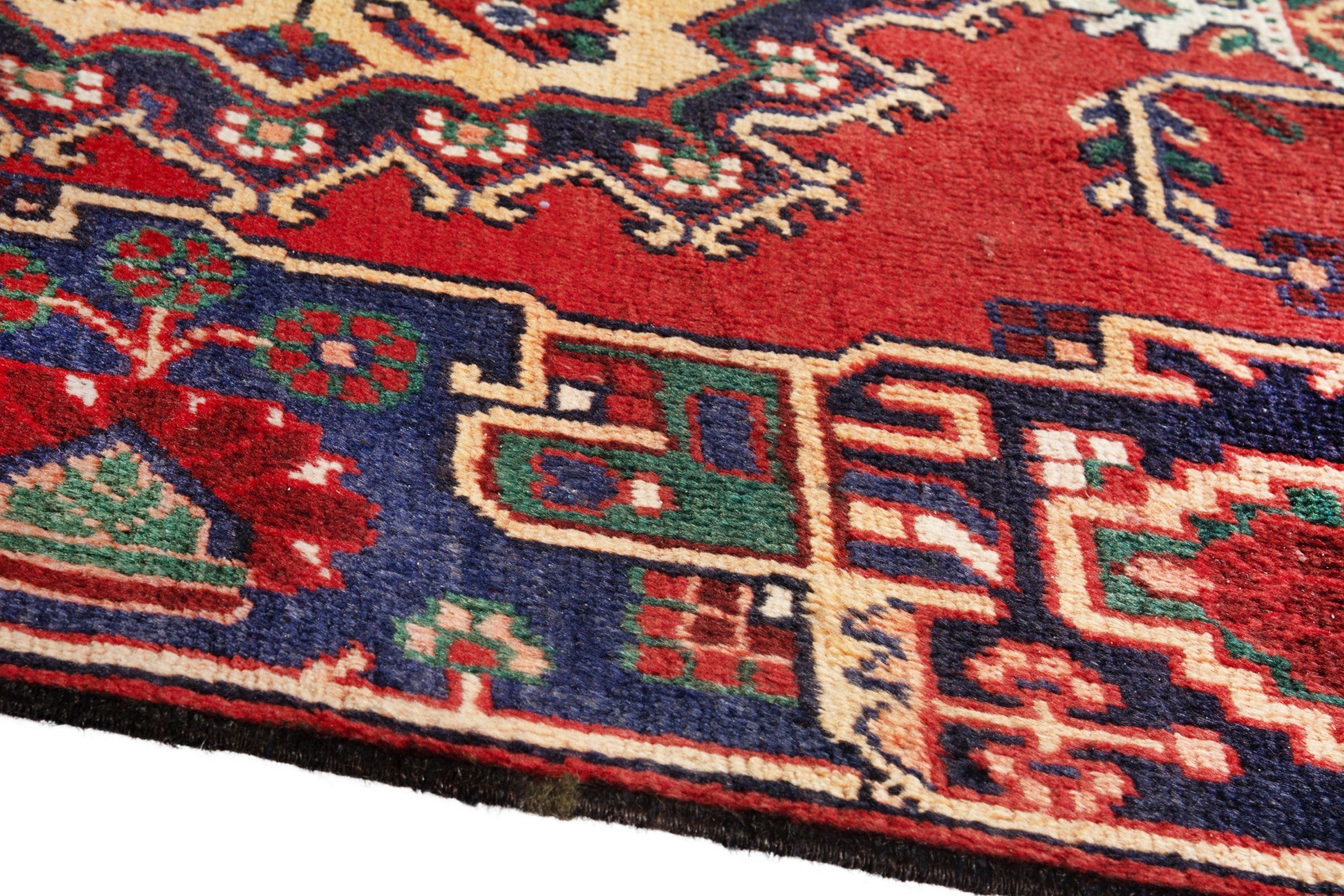 Persian Ferdos area rug in deep red and navy, view 8 of 17
