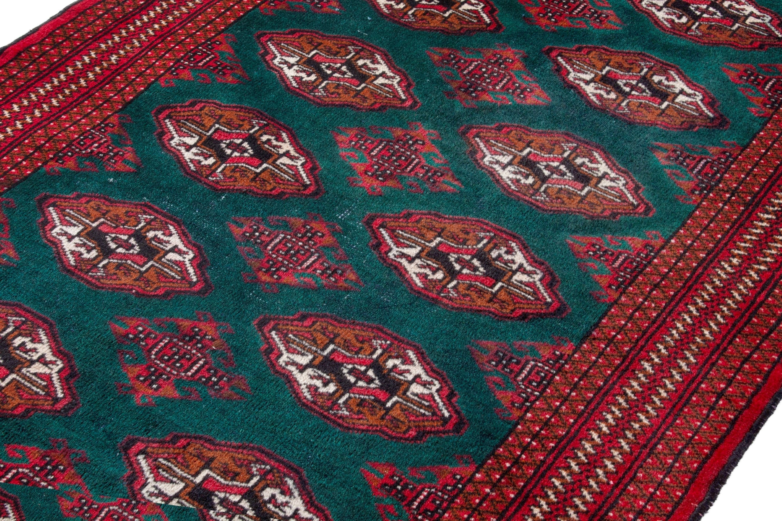 Persian Torkaman accent rug in burgundy and teal, view 6 of 16