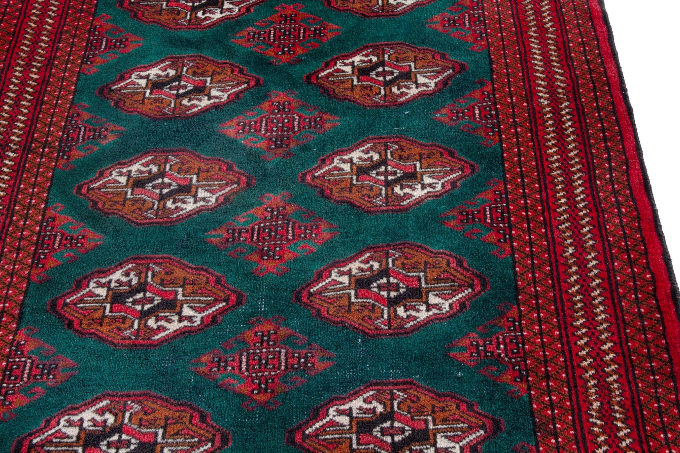 Persian Torkaman accent rug in burgundy and teal, view 7 of 16