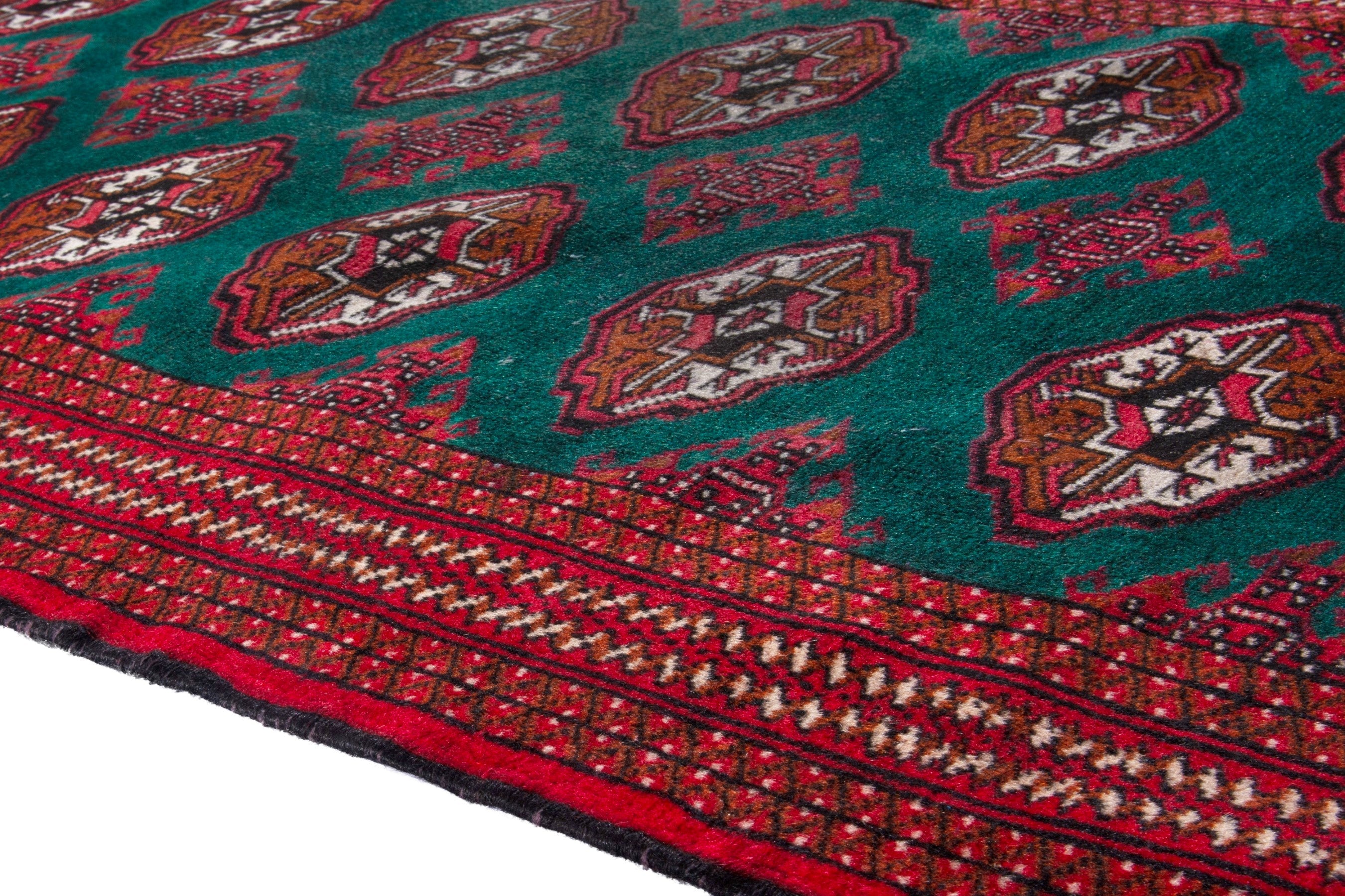 Persian Torkaman accent rug in burgundy and teal, view 8 of 16