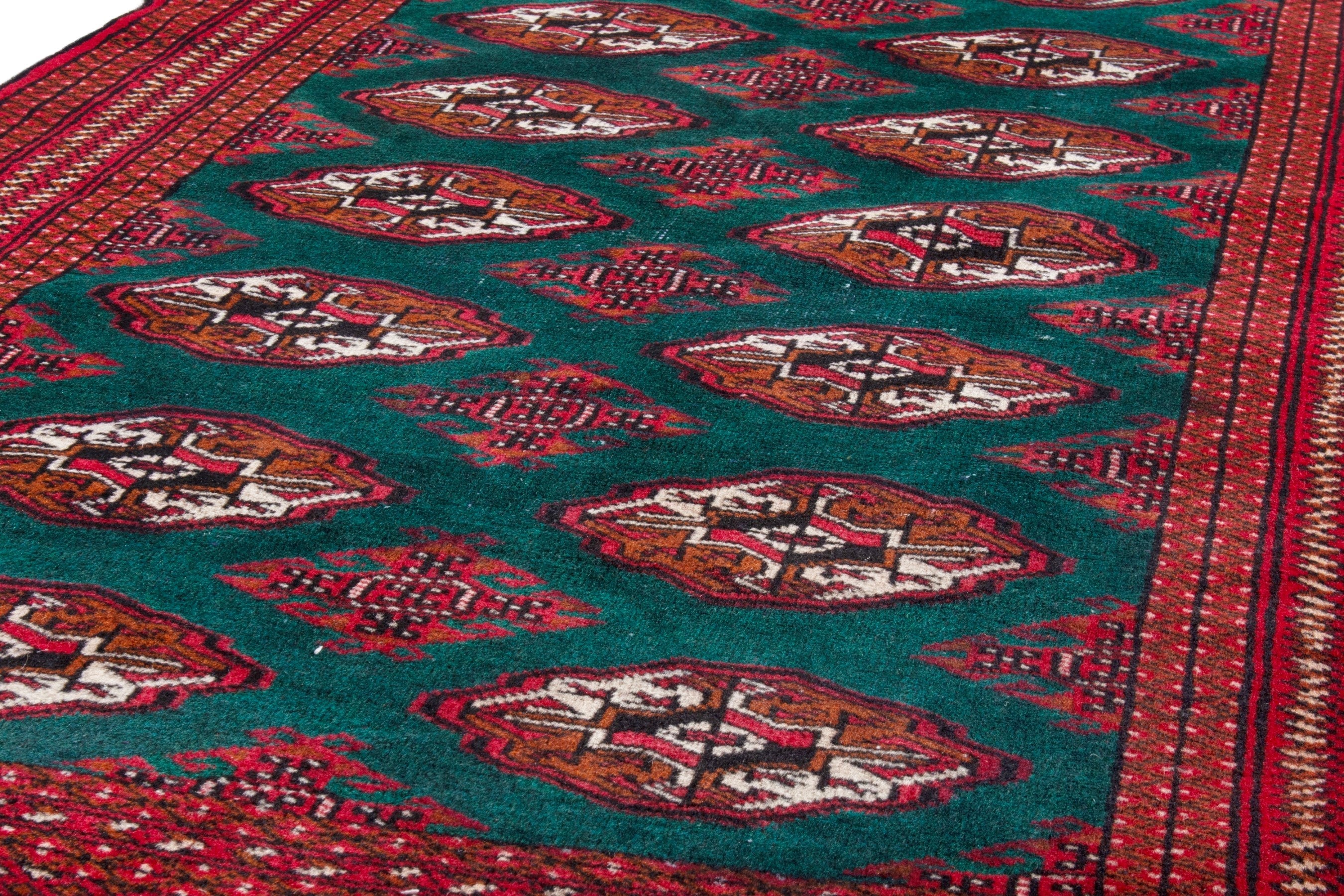 Persian Torkaman accent rug in burgundy and teal, view 9 of 16