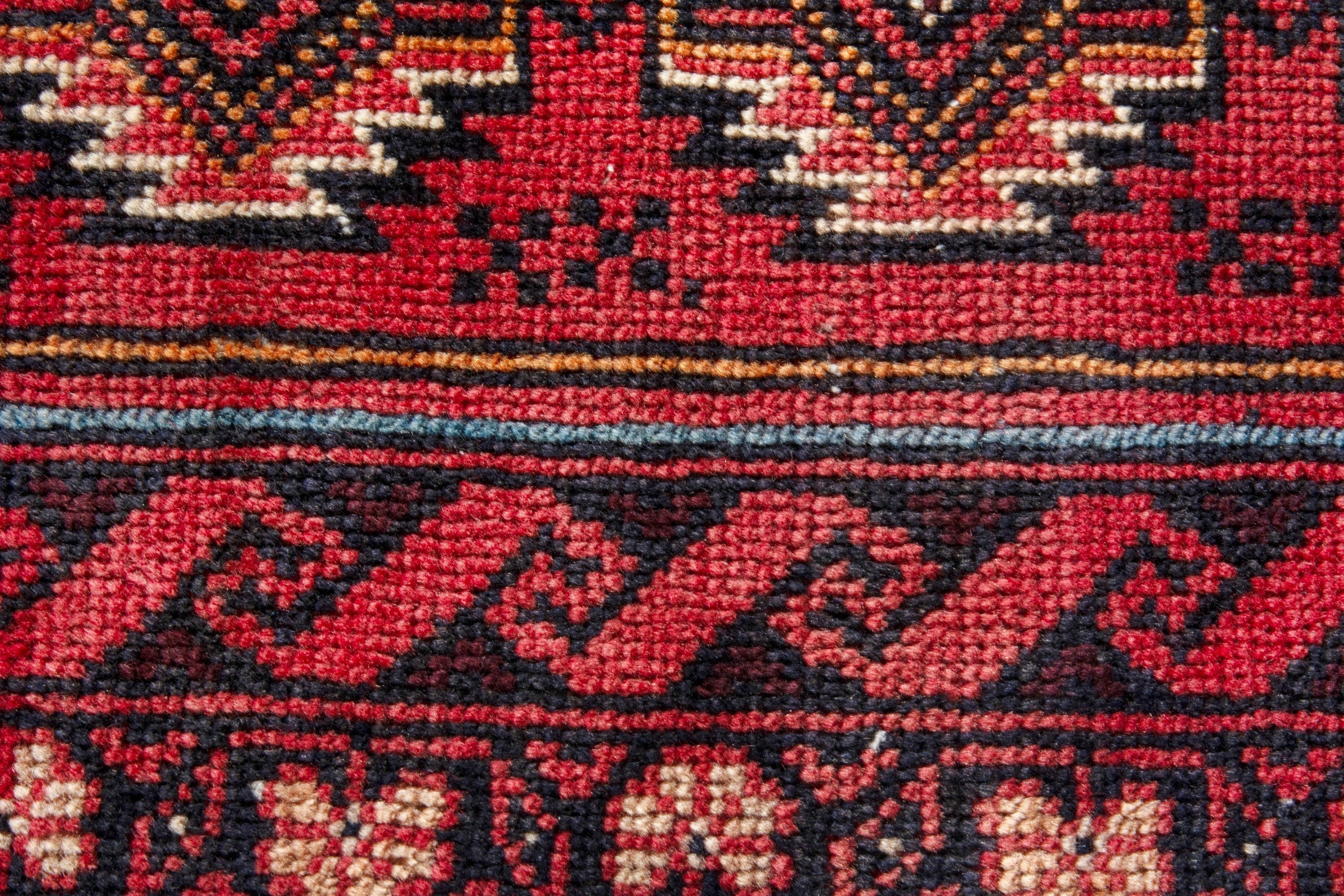 Persian Torkaman accent rug in deep red and faded red, view 13 of 17