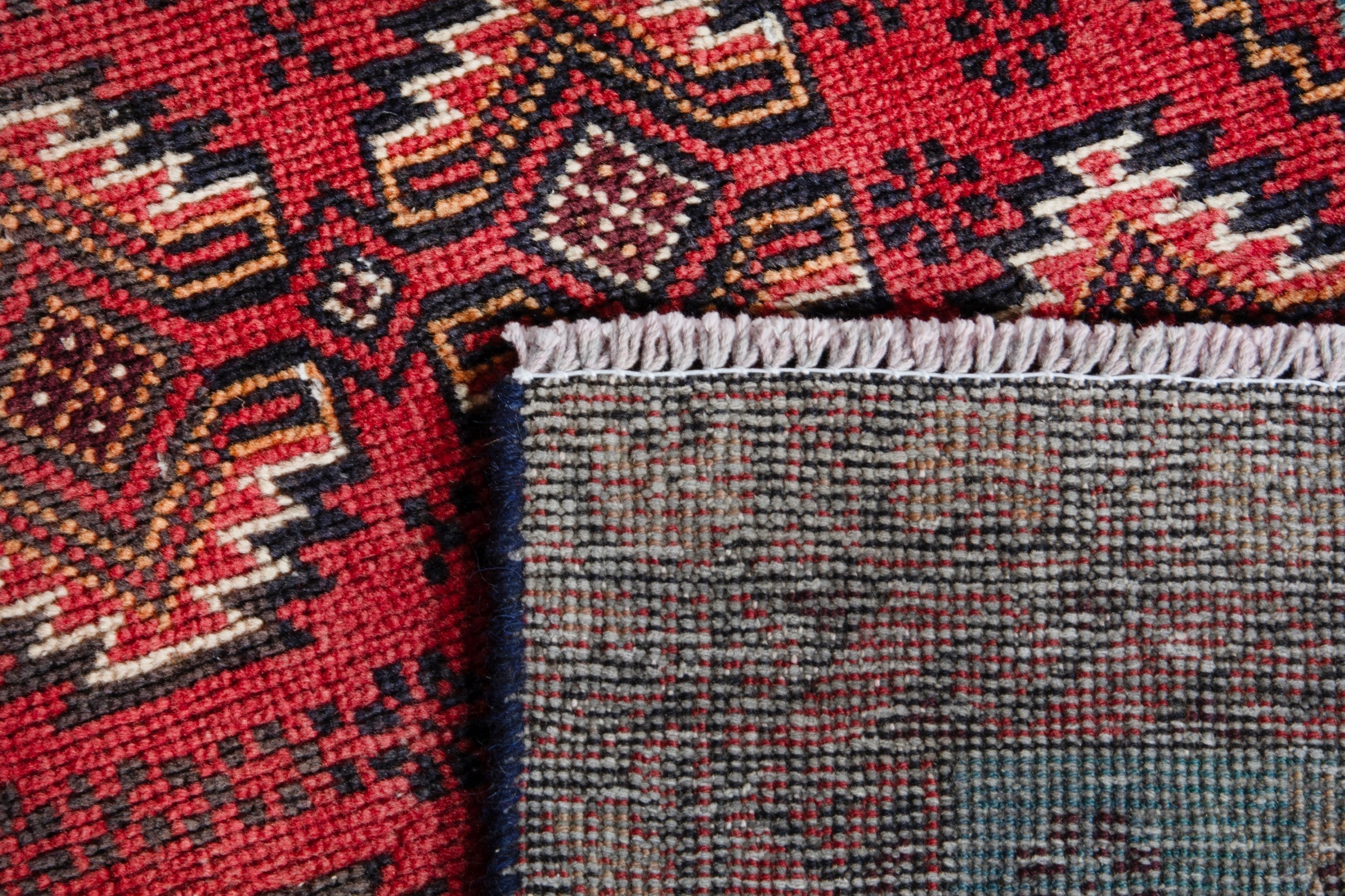 Persian Torkaman accent rug in deep red and faded red, view 17 of 17
