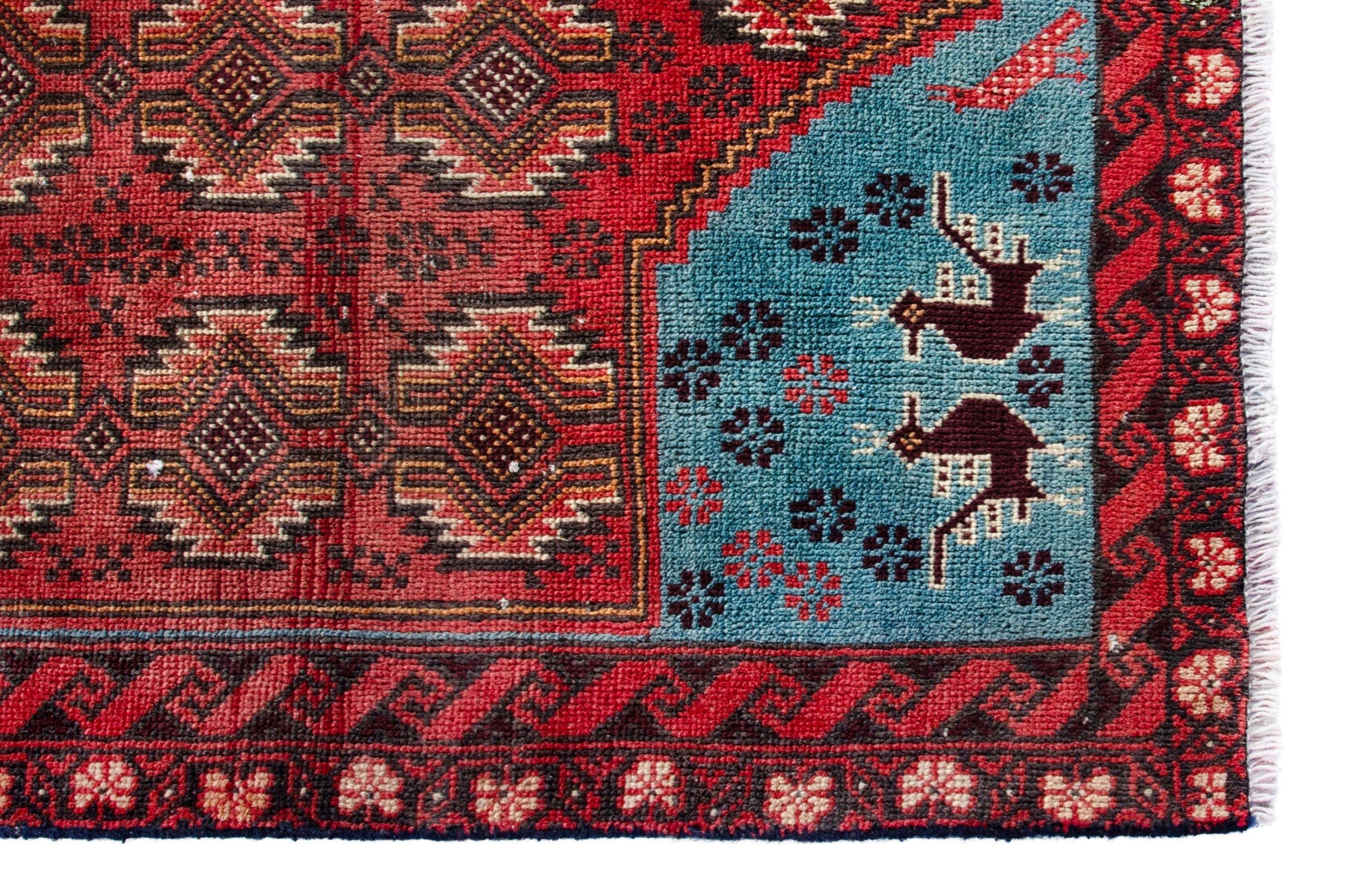 Persian Torkaman accent rug in deep red and faded red, view 5 of 17