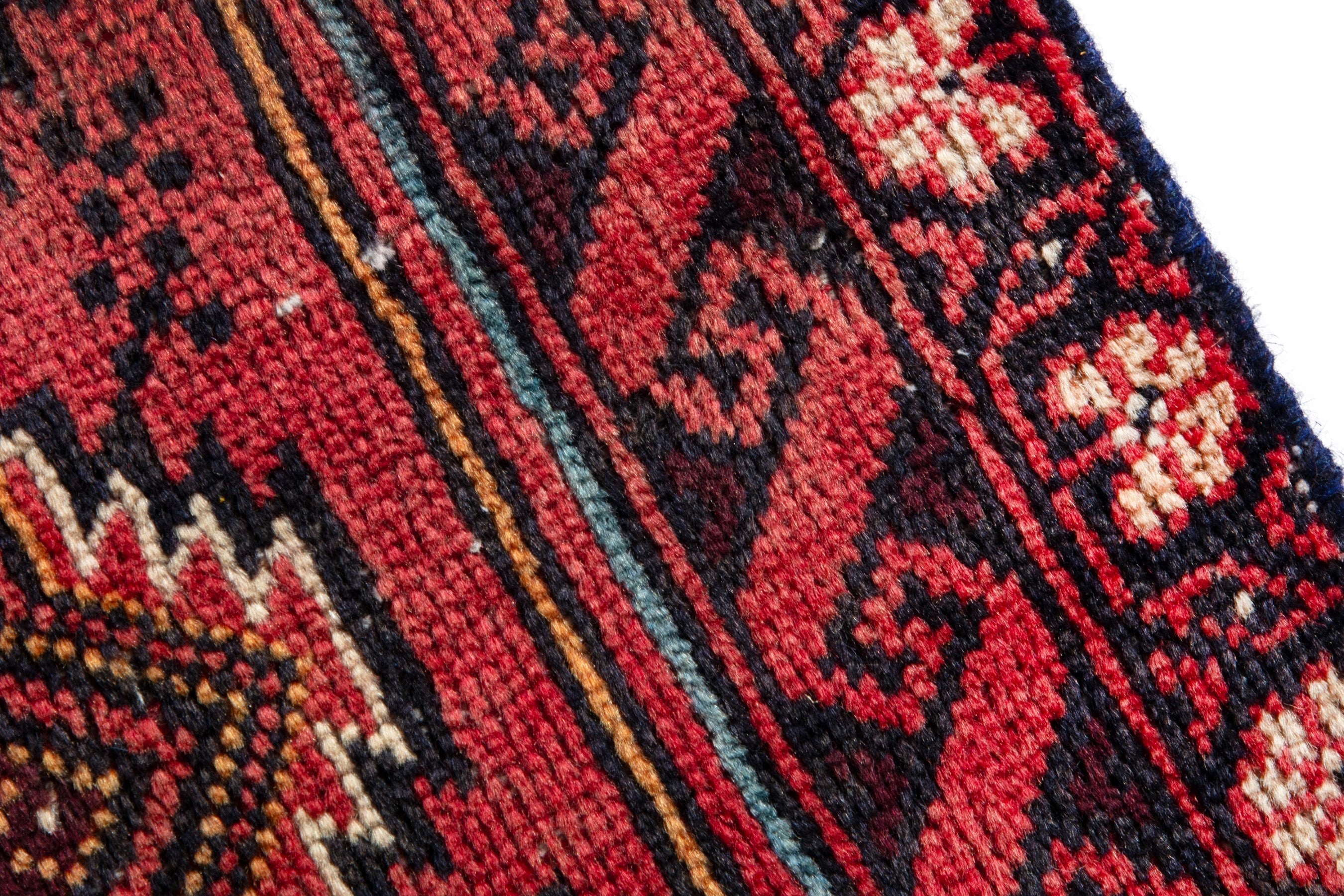 Persian Torkaman accent rug in deep red and faded red, view 7 of 17