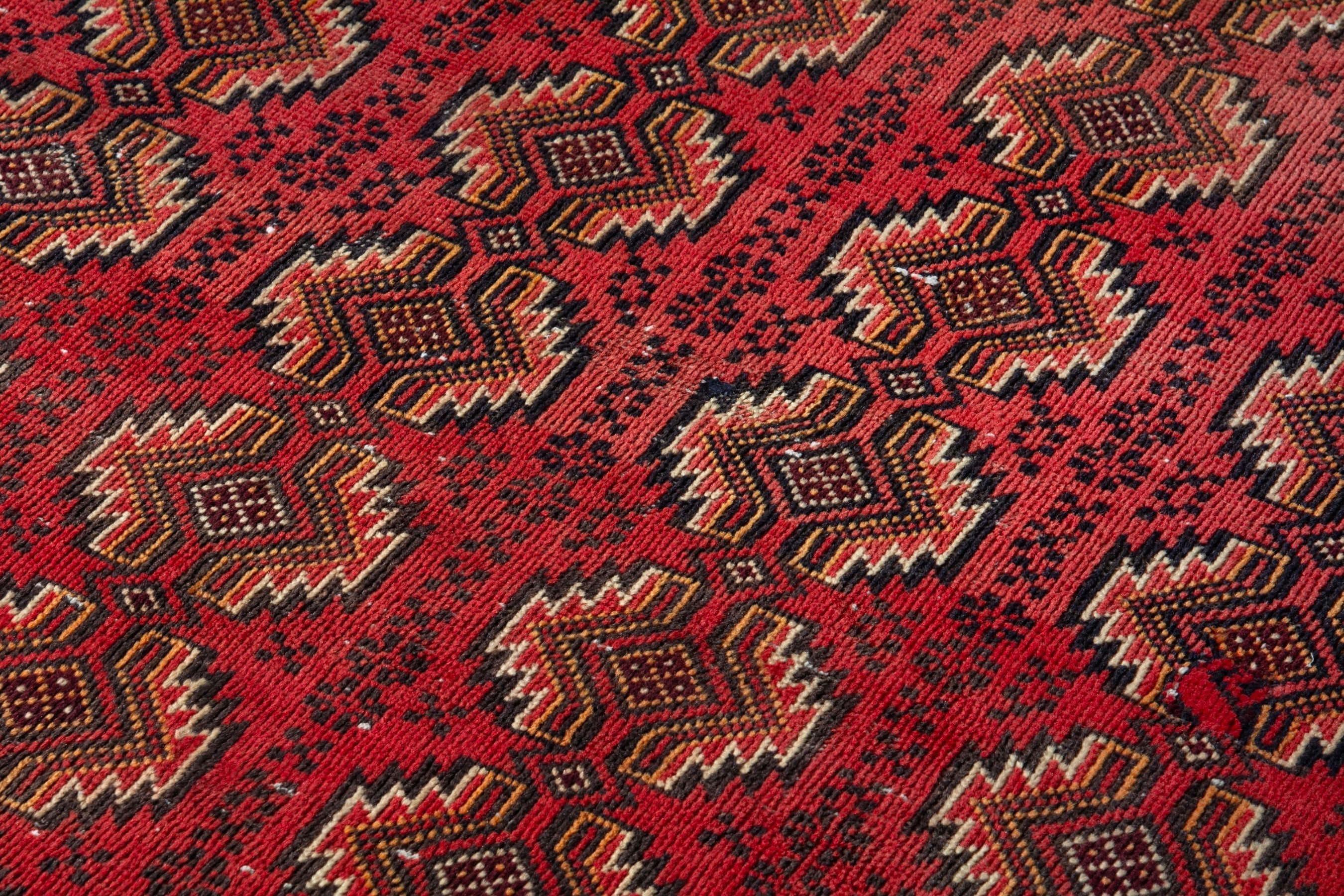 Persian Torkaman accent rug in deep red and faded red, view 9 of 17