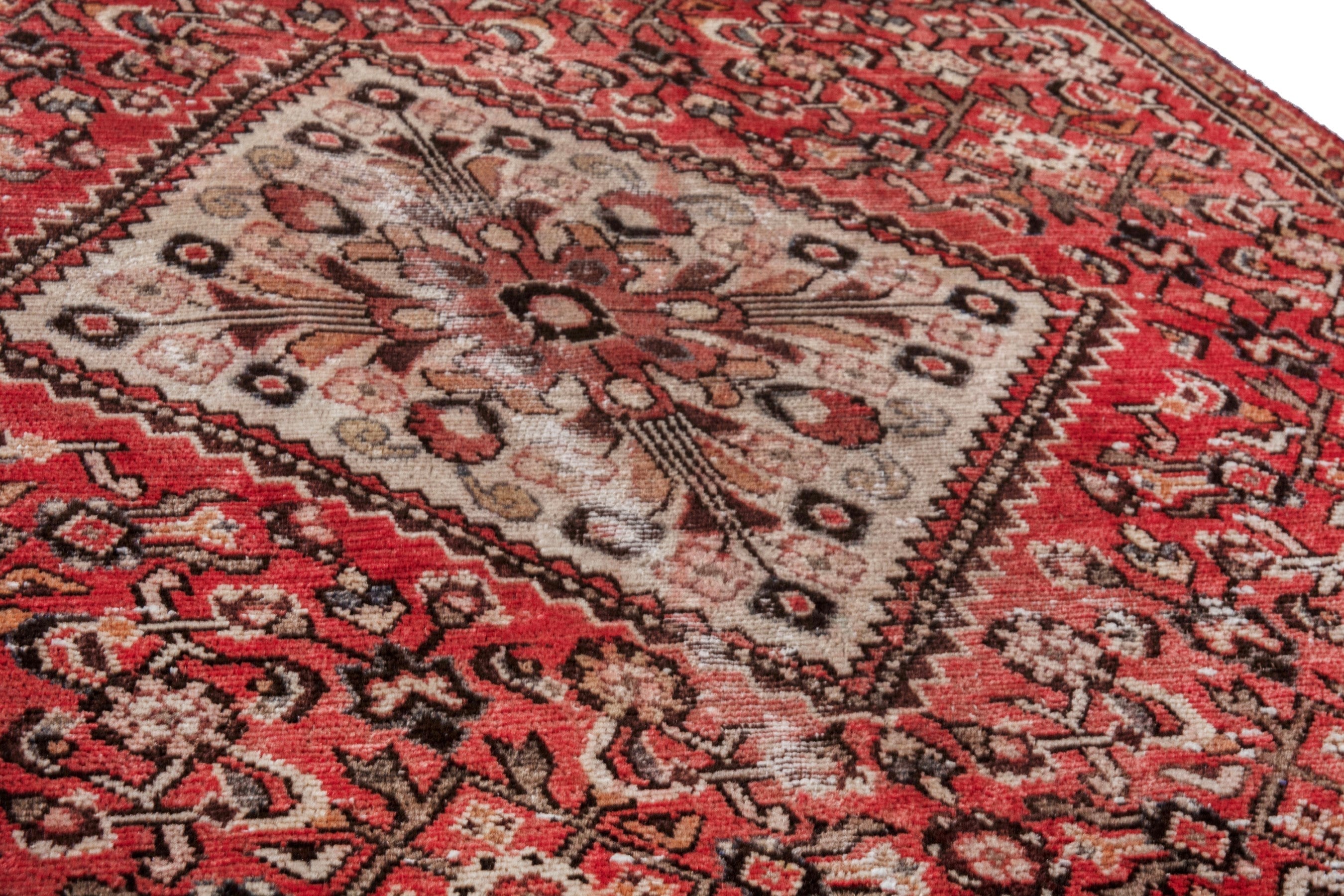 Persian Hosseinabad area rug in deep red and cream, view 10 of 20