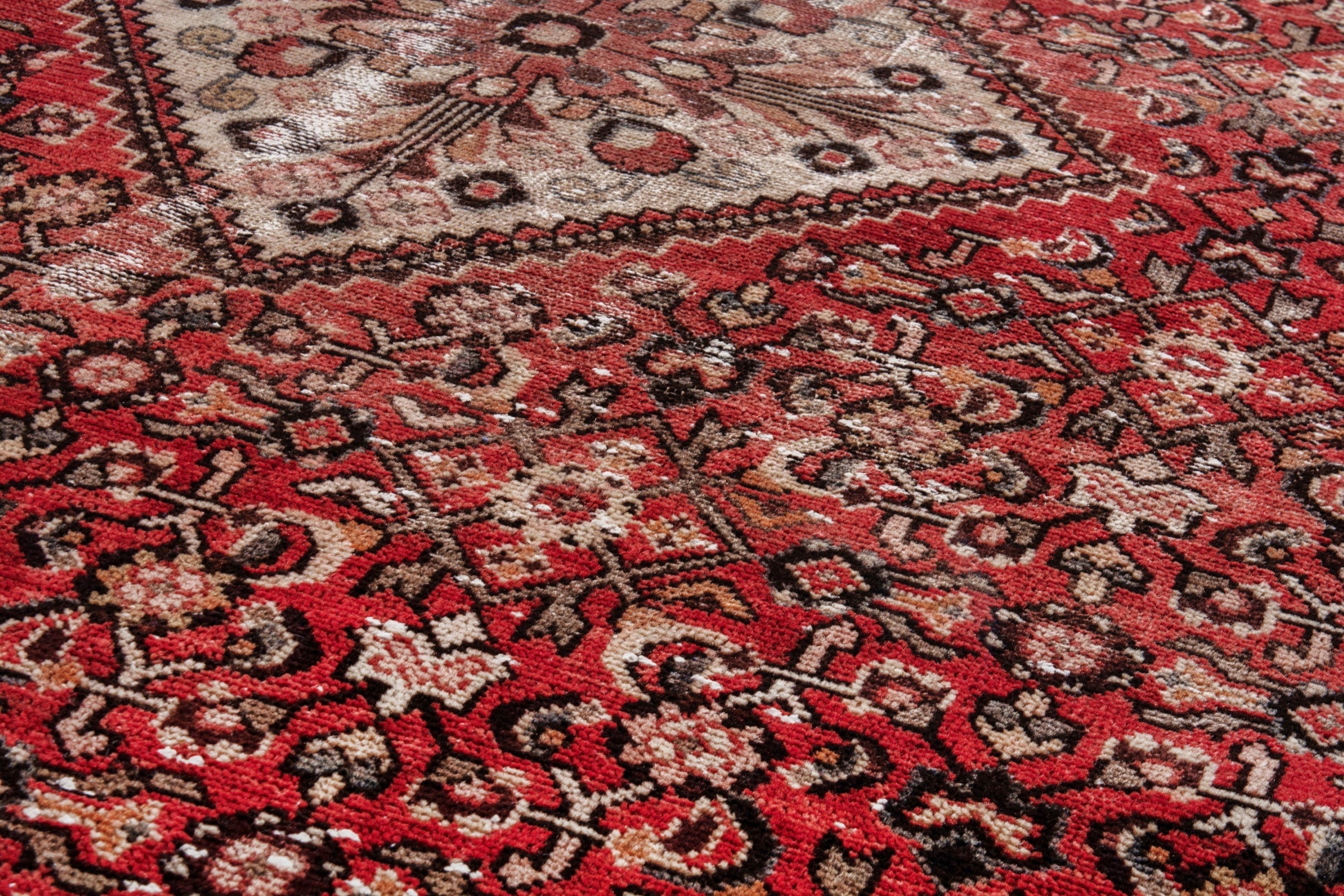 Persian Hosseinabad area rug in deep red and cream, view 9 of 20