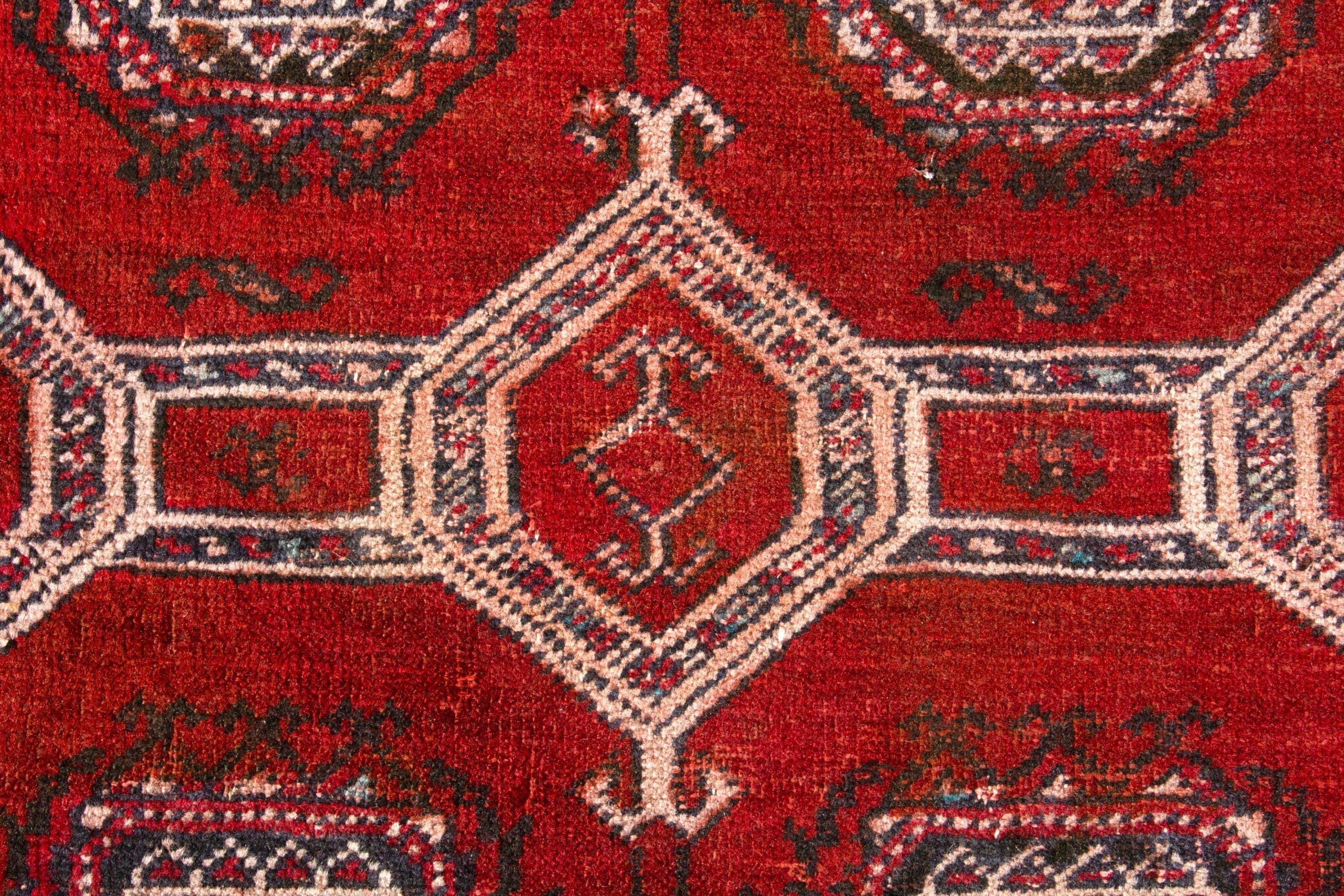 Persian Torkaman accent rug in deep red and cream, view 11 of 17