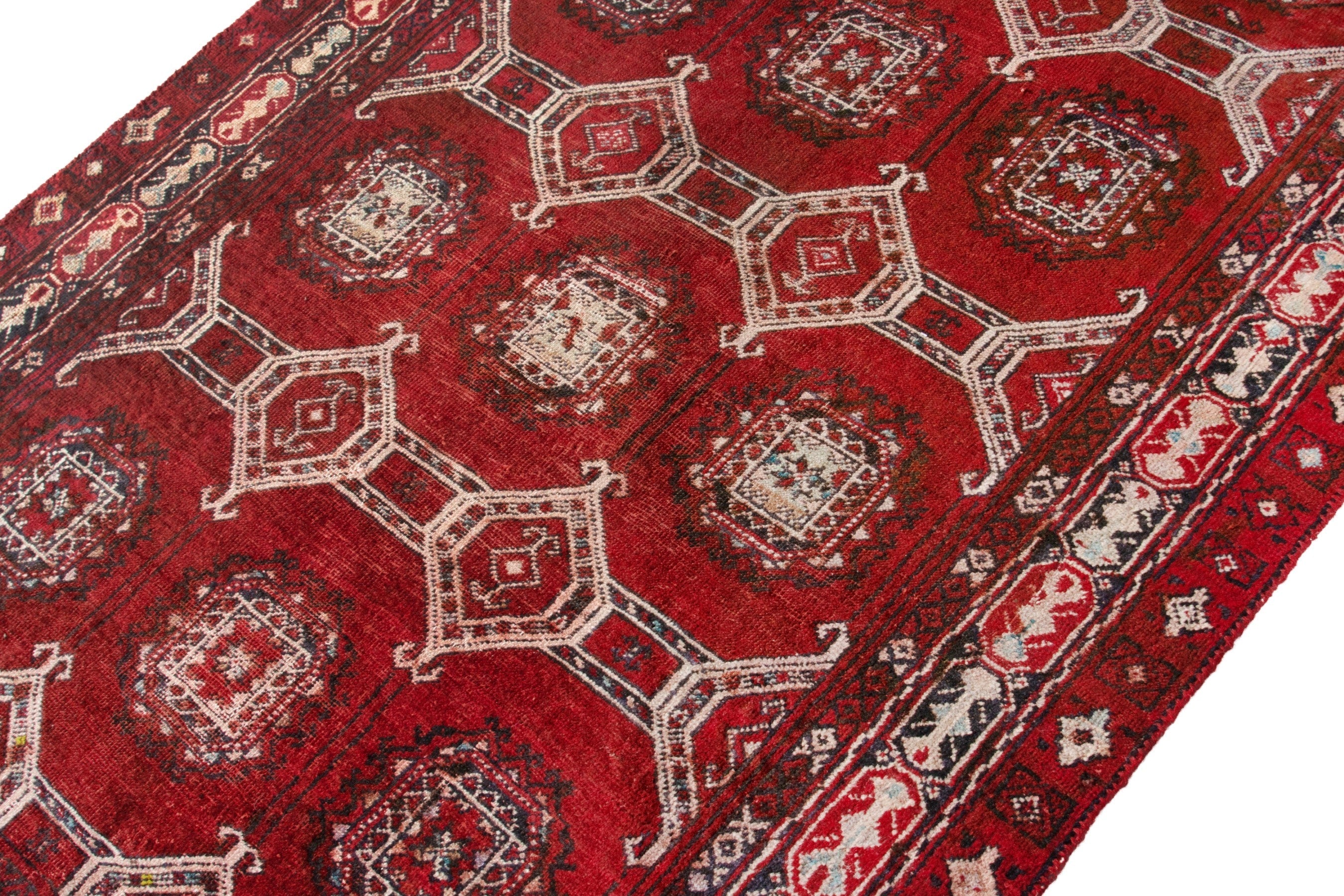 Persian Torkaman accent rug in deep red and cream, view 6 of 17