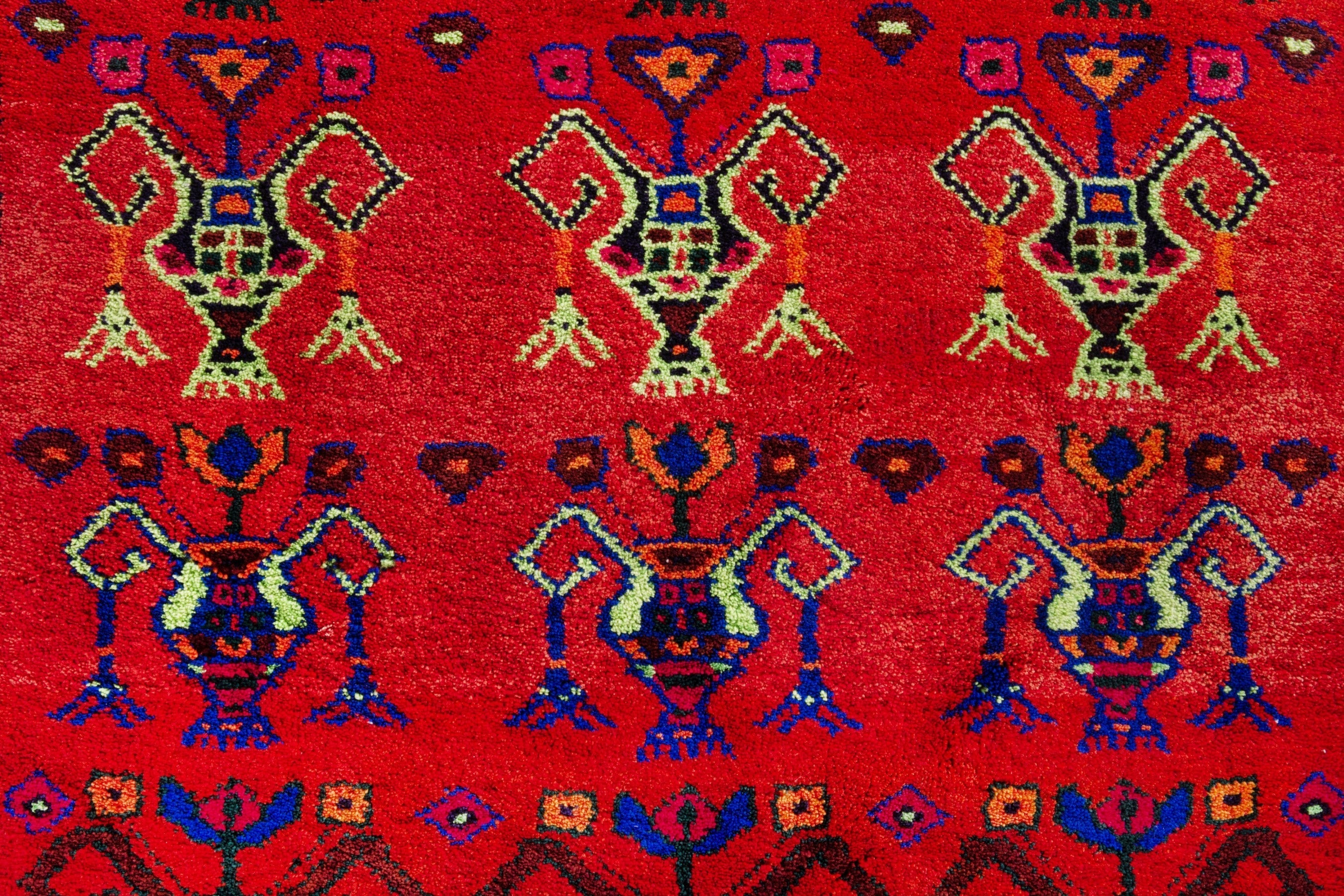 Persian Lori accent rug in deep red and navy, view 10 of 18