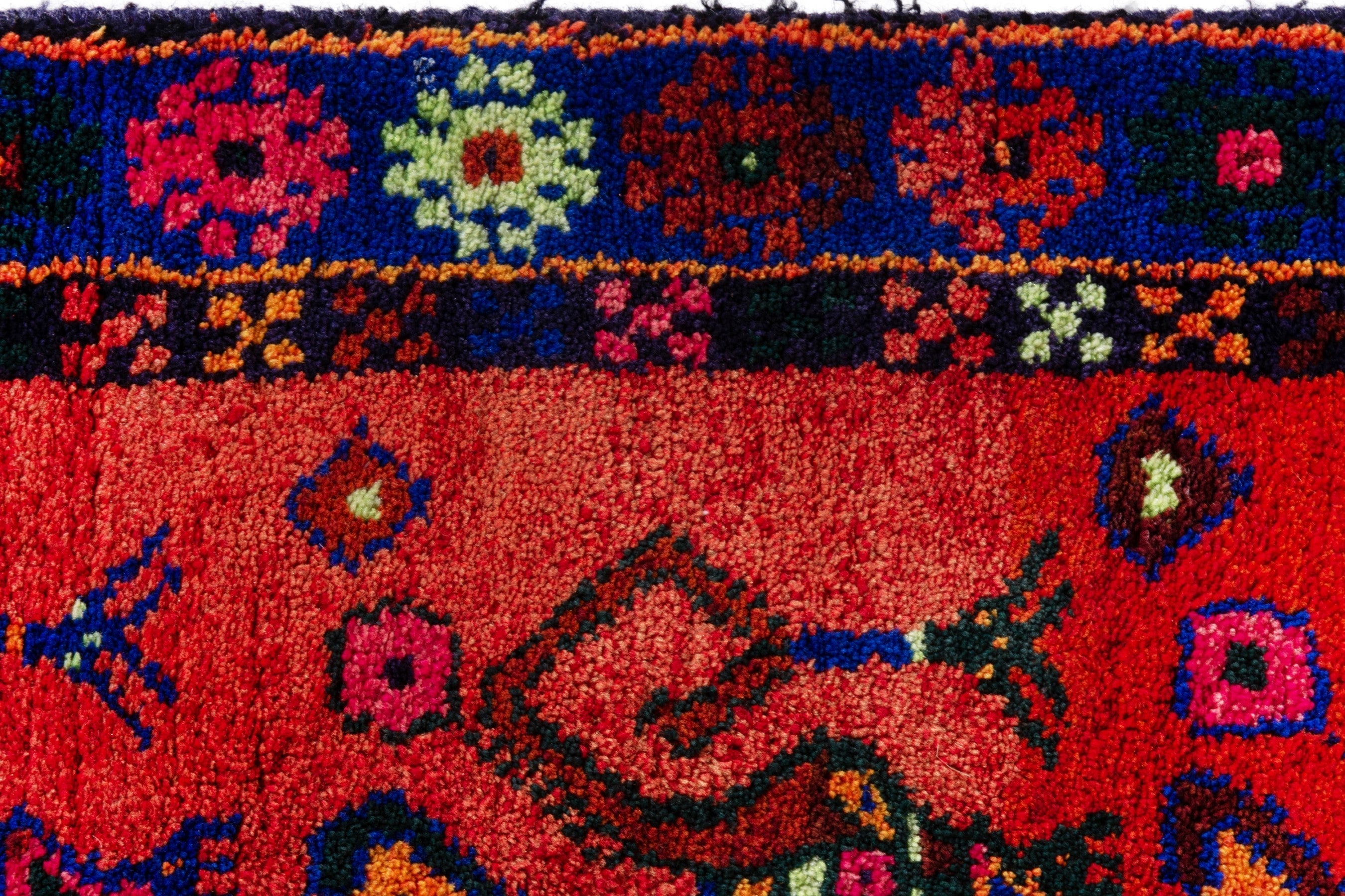 Persian Lori accent rug in deep red and navy, view 11 of 18