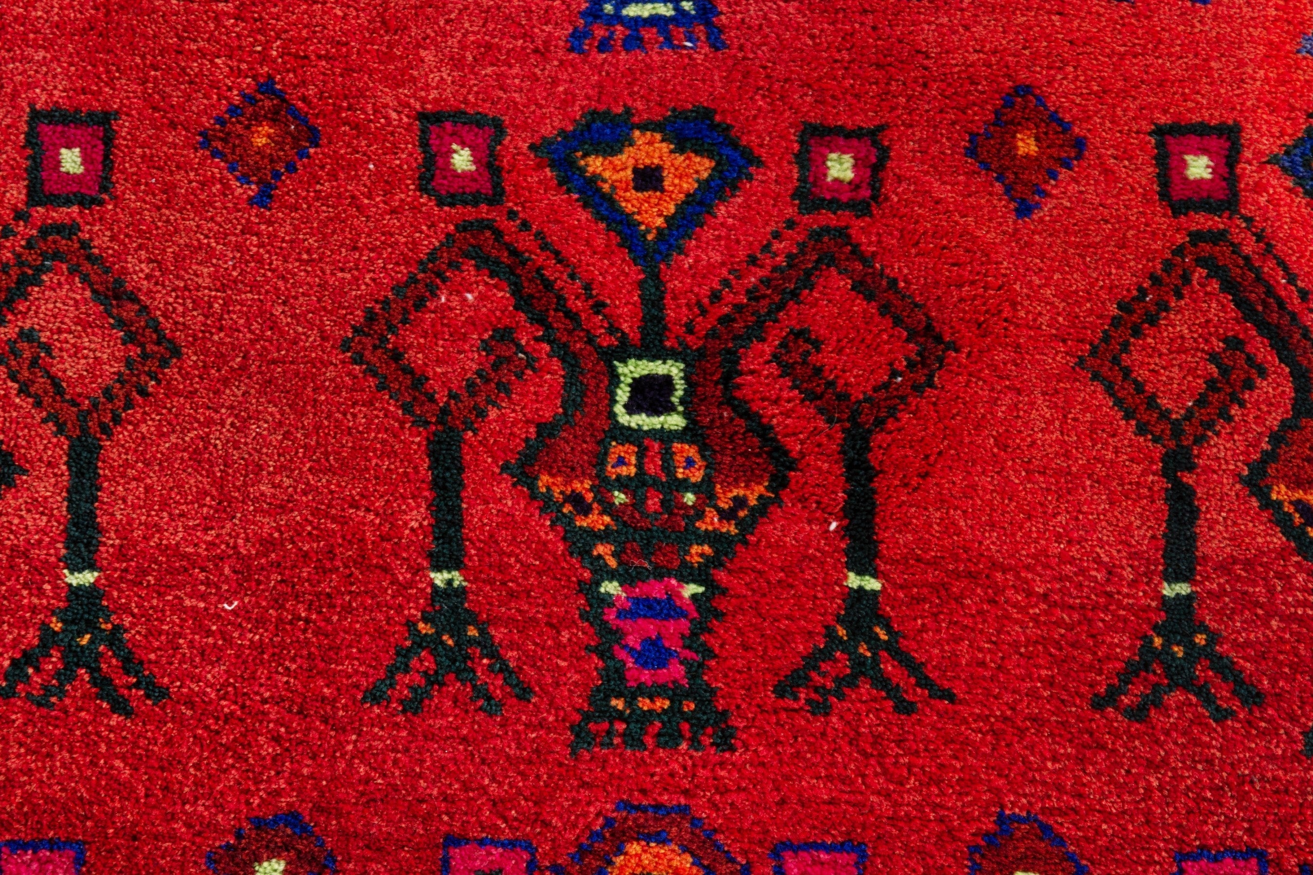 Persian Lori accent rug in deep red and navy, view 12 of 18