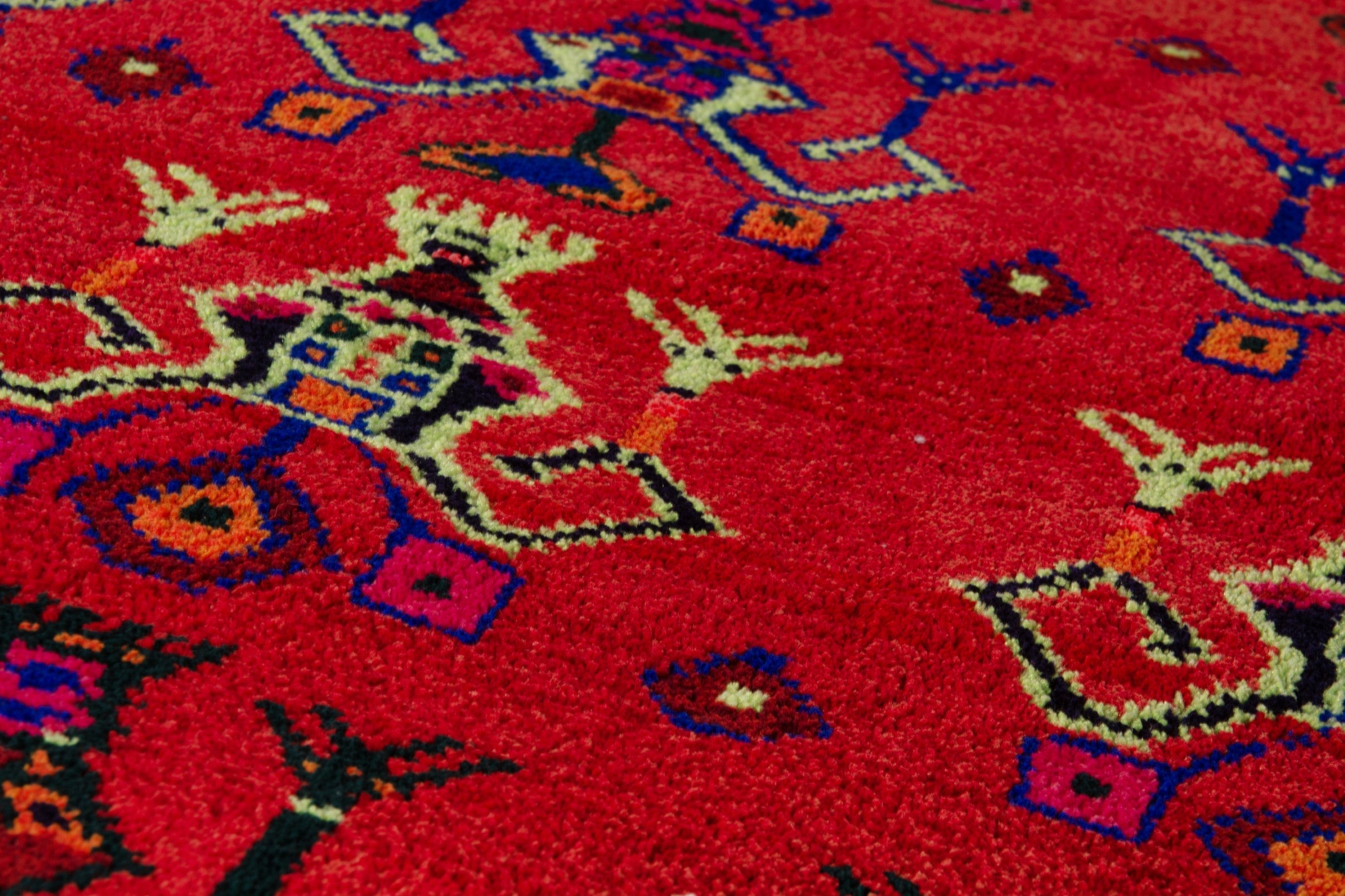 Persian Lori accent rug in deep red and navy, view 13 of 18