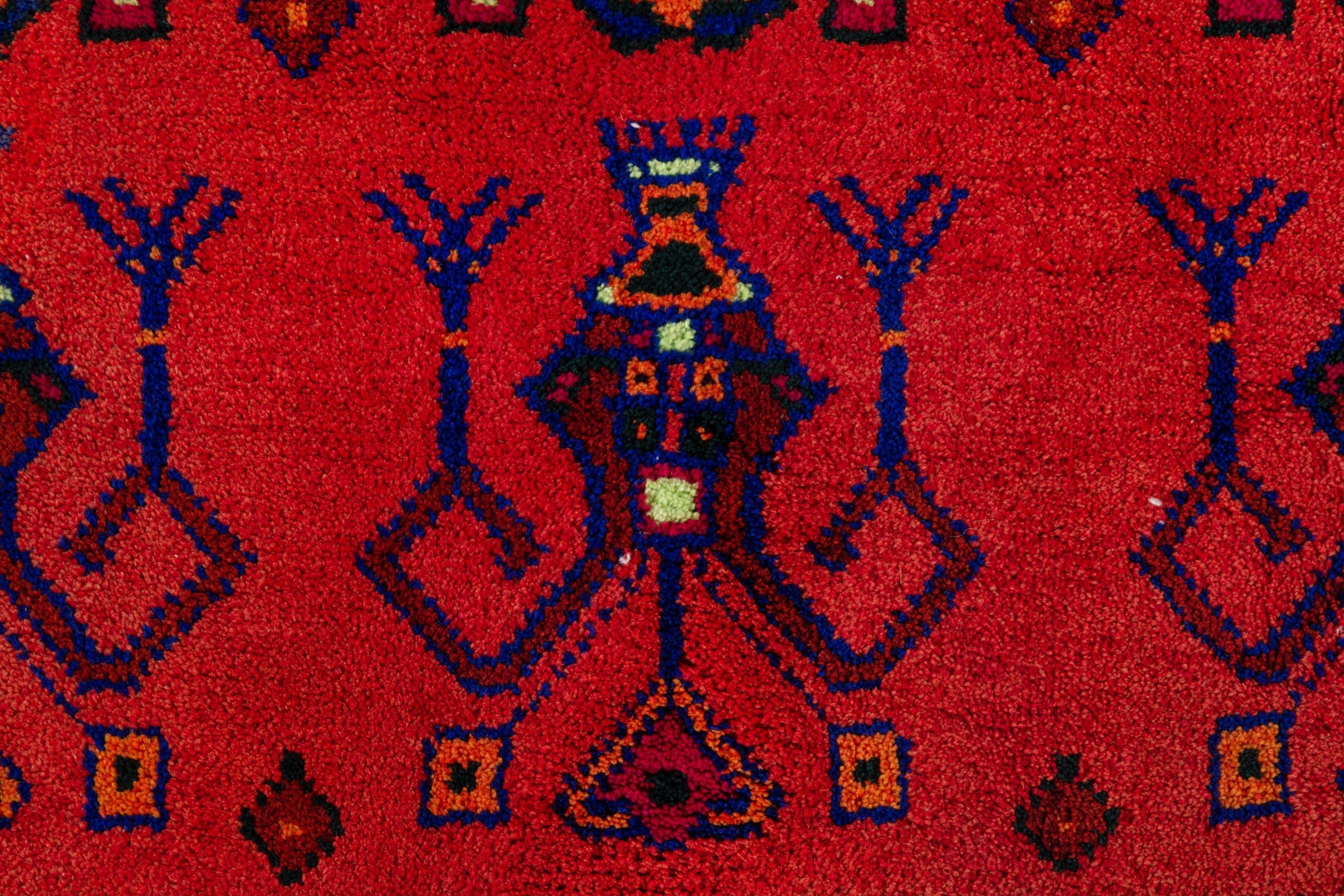 Persian Lori accent rug in deep red and navy, view 14 of 18