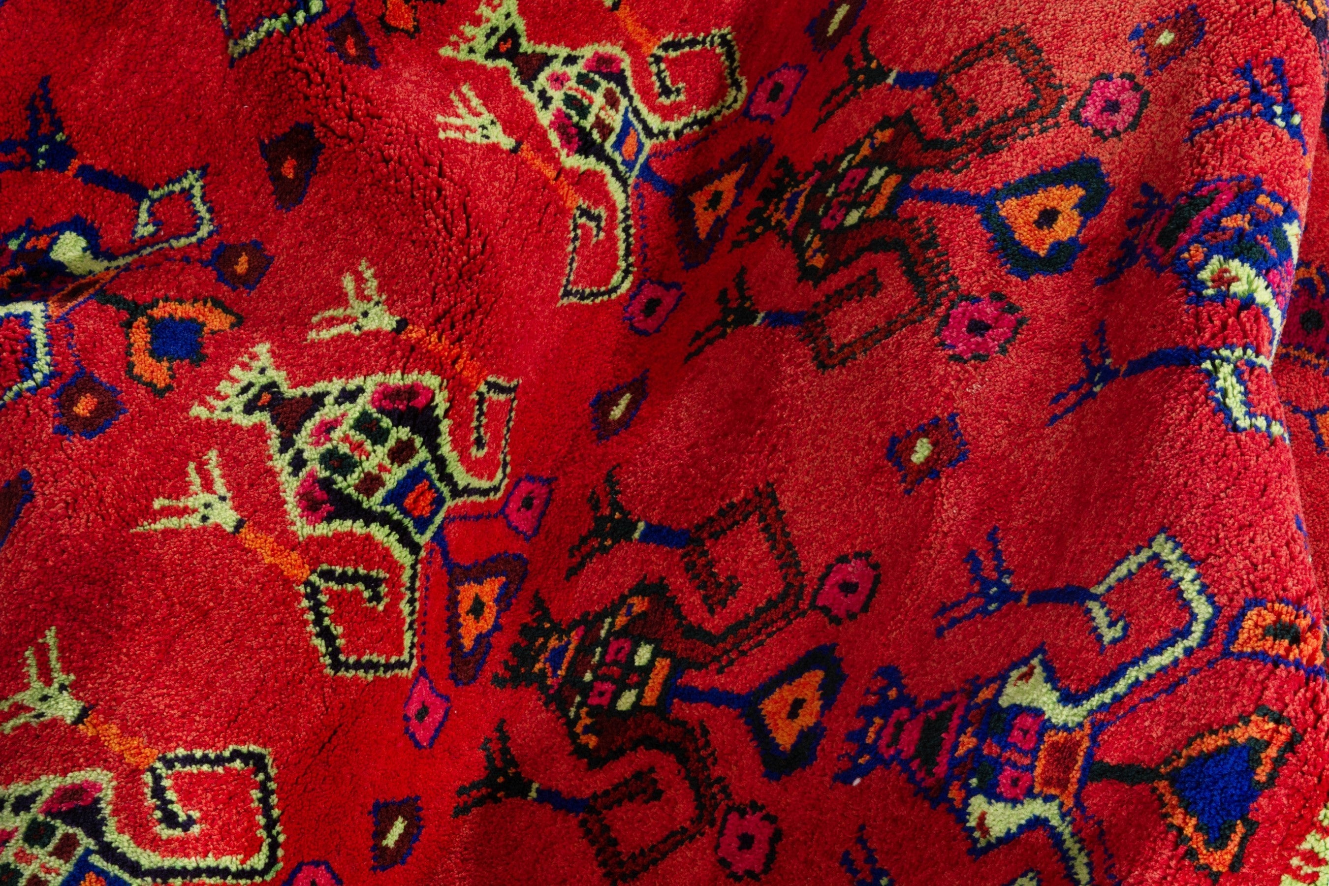 Persian Lori accent rug in deep red and navy, view 15 of 18