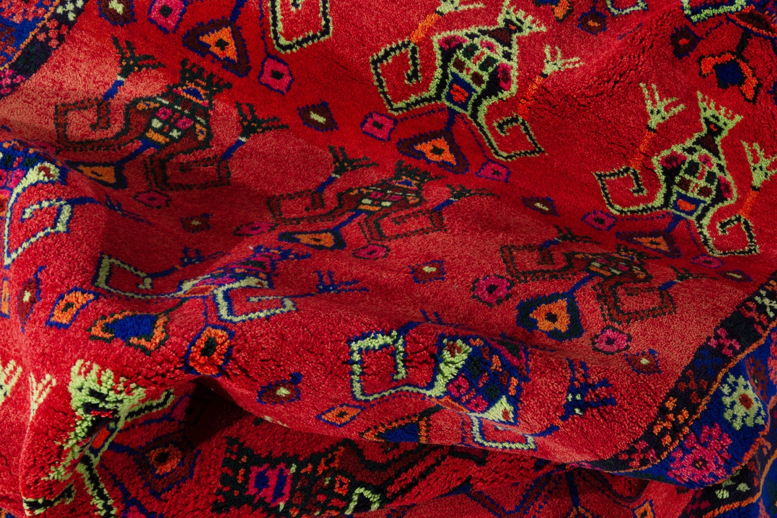 Persian Lori accent rug in deep red and navy, view 16 of 18