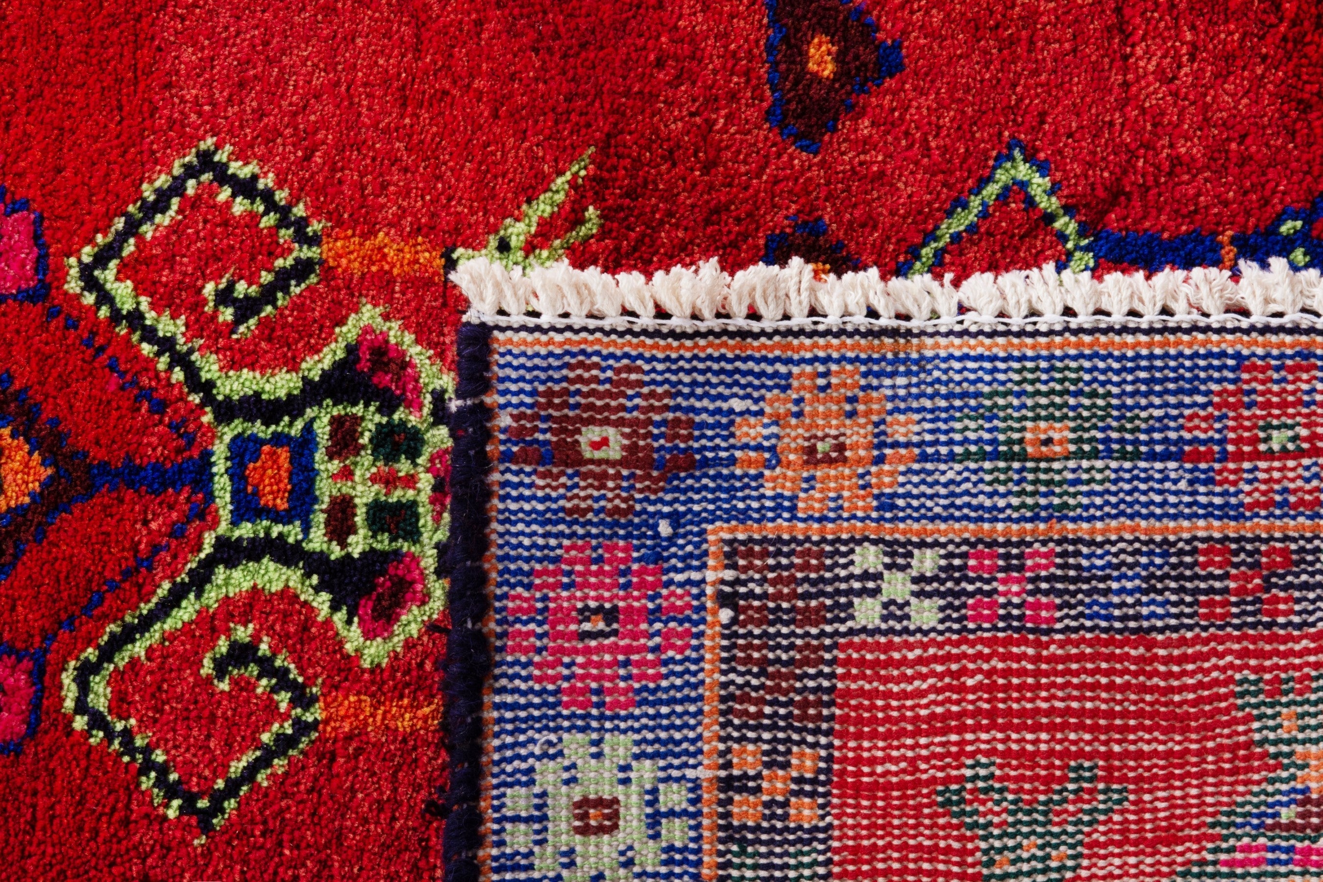 Persian Lori accent rug in deep red and navy, view 18 of 18