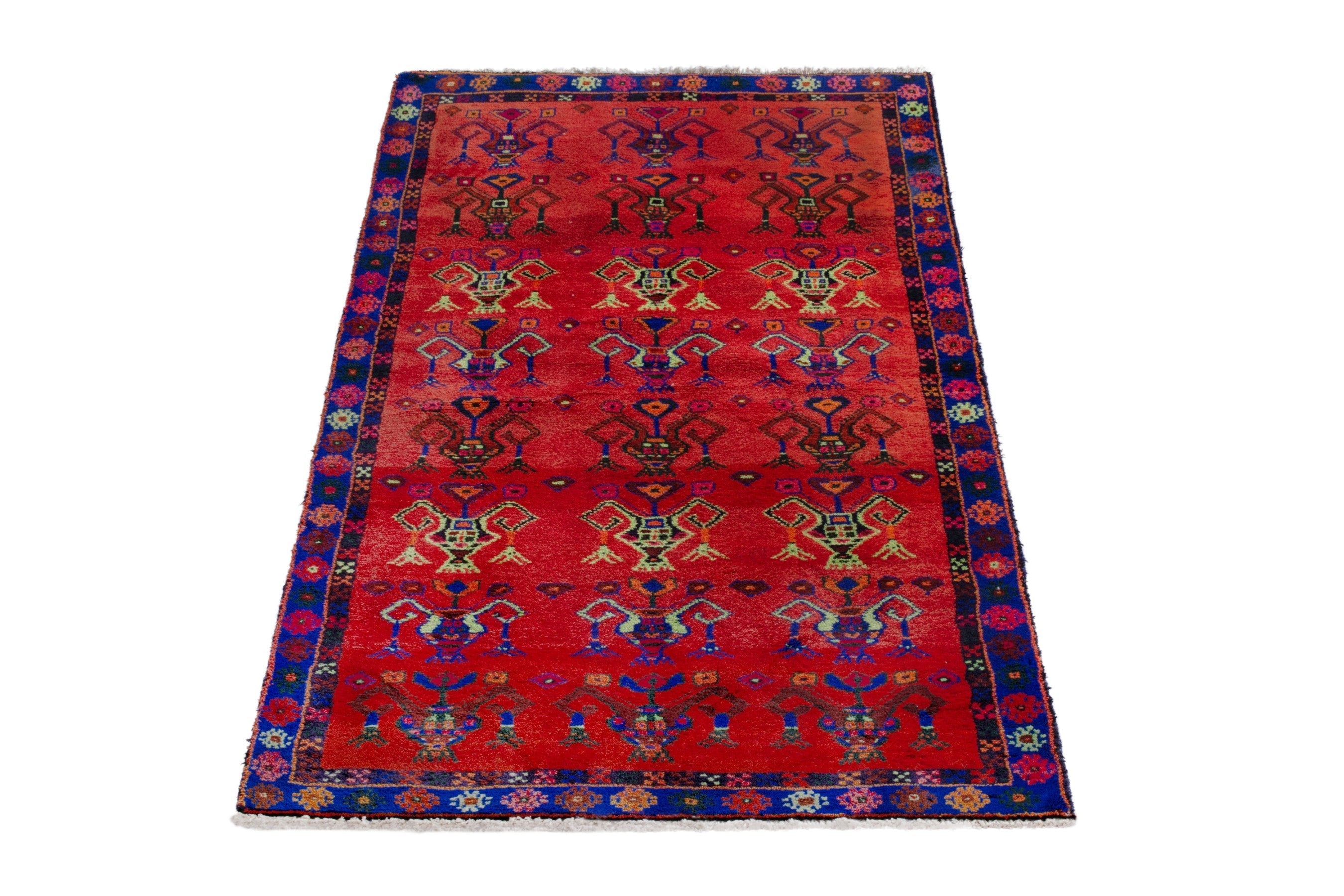 Persian Lori accent rug in deep red and navy, view 3 of 18
