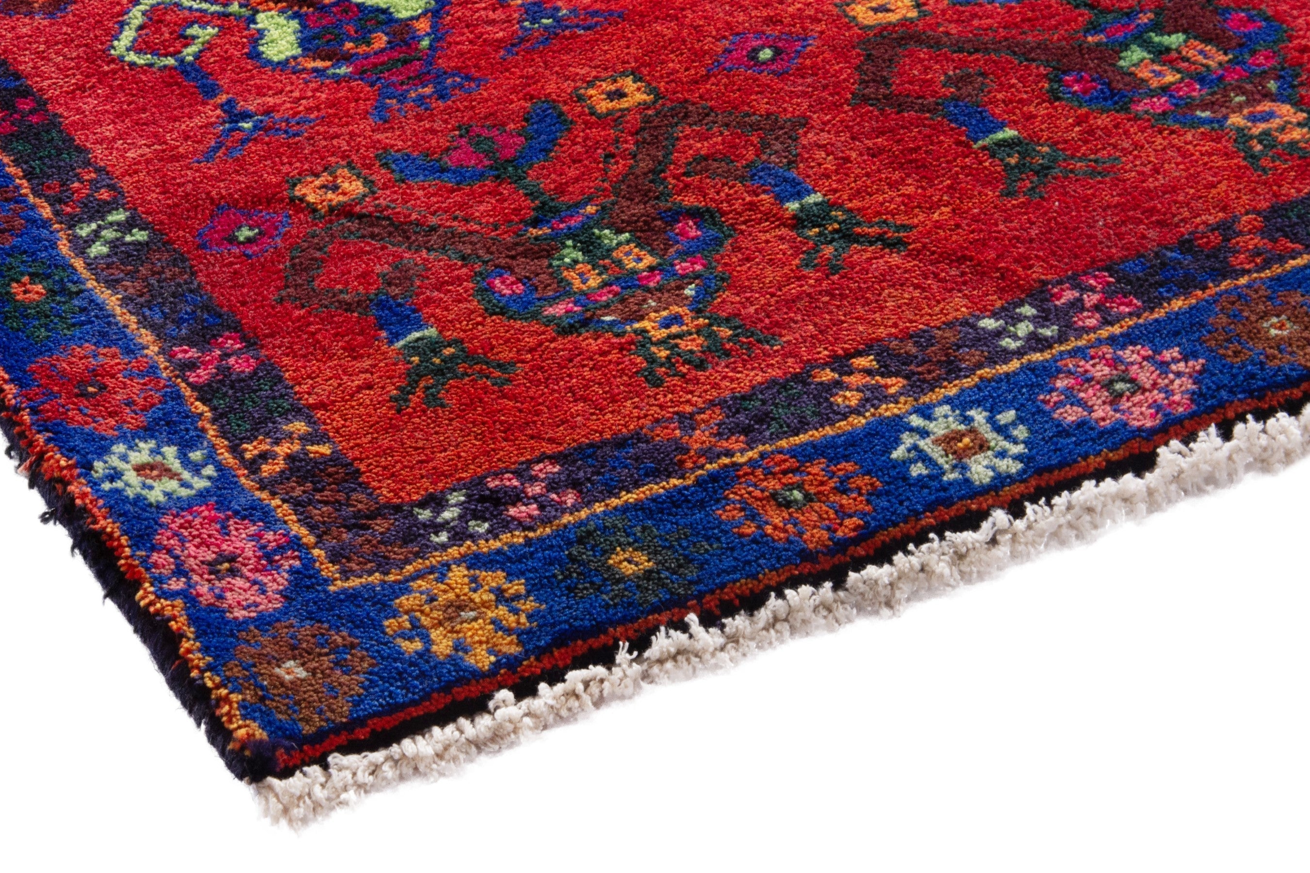 Persian Lori accent rug in deep red and navy, view 4 of 18