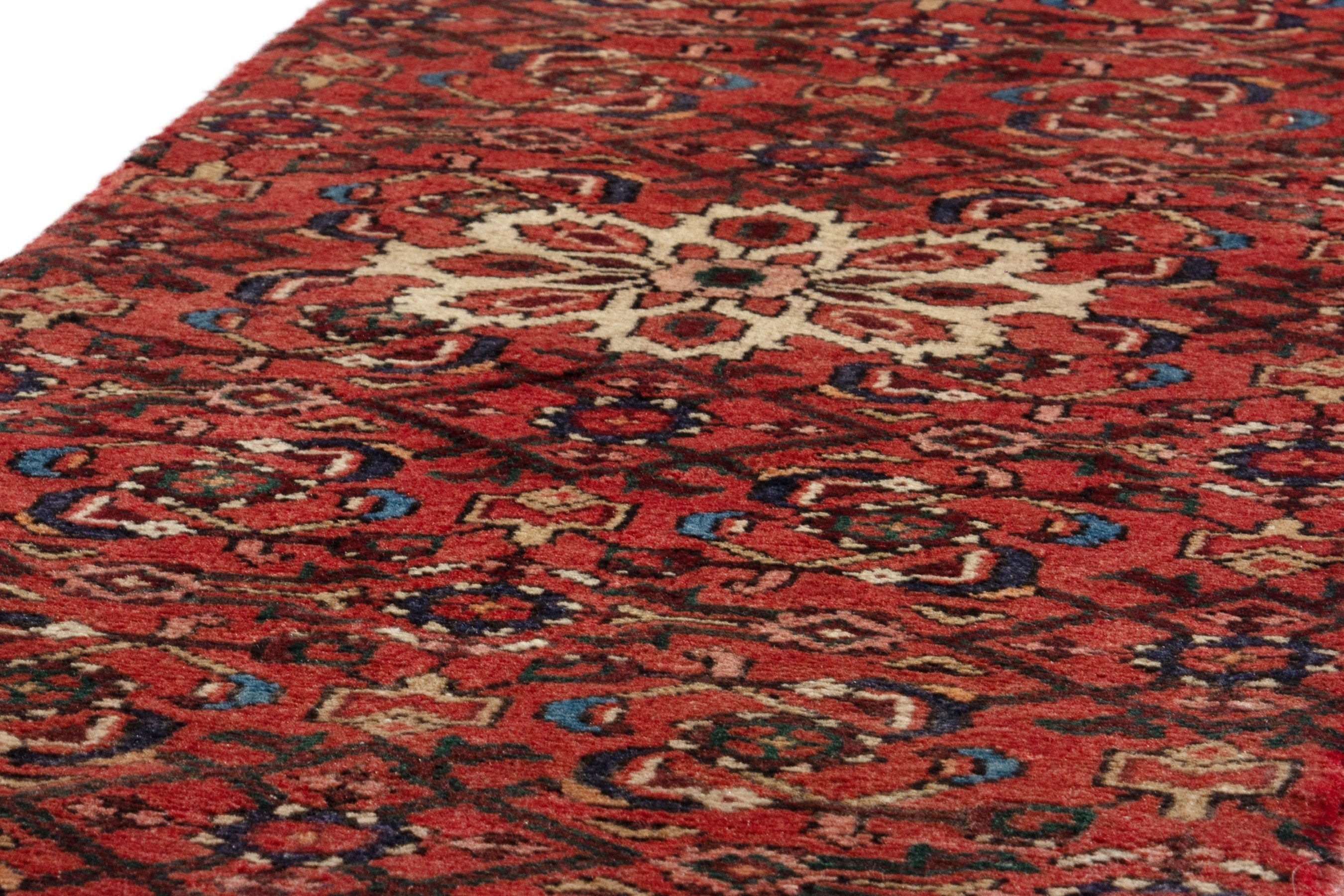 Persian Hosseinabad runner rug in deep red and muted pink, view 10 of 18