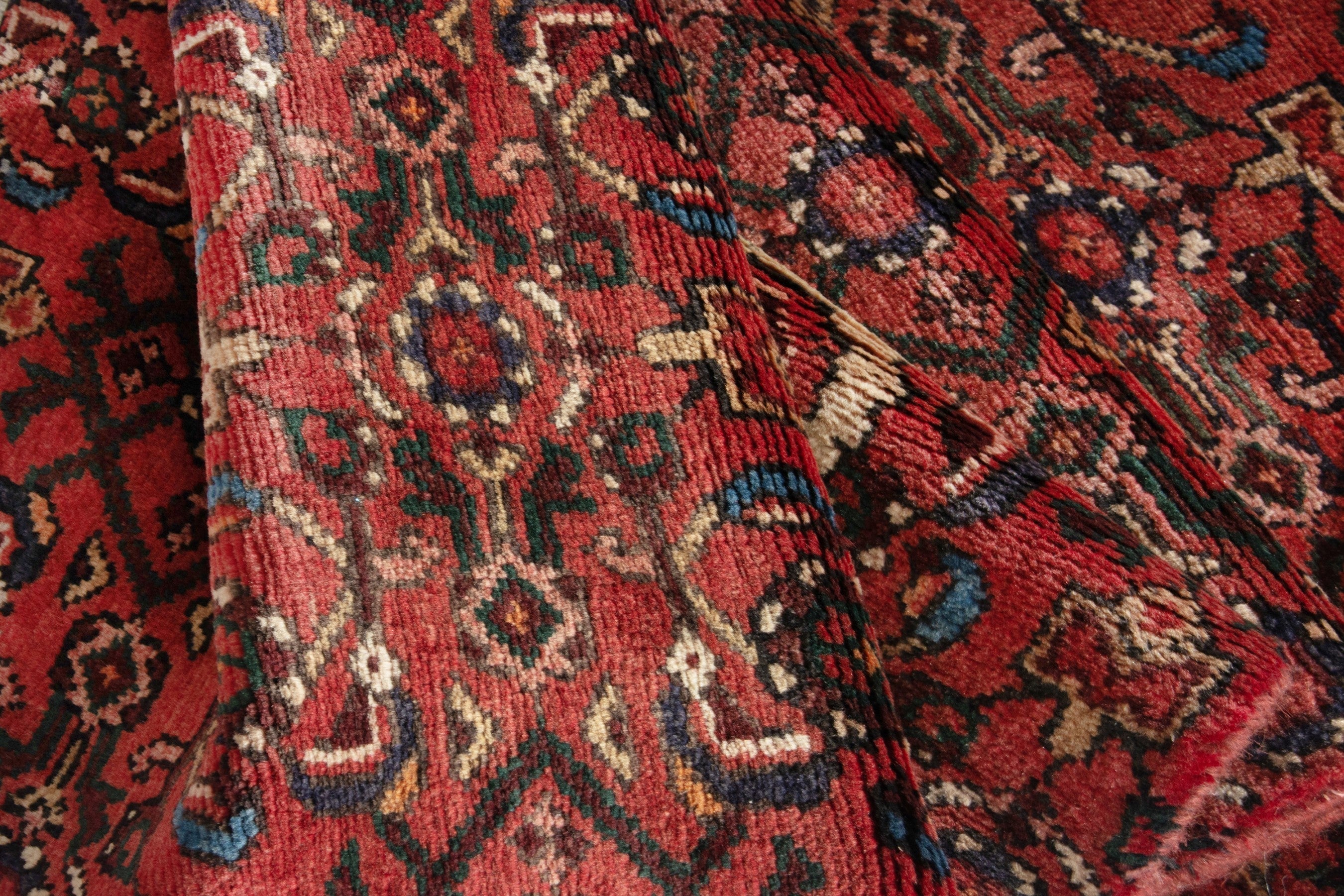 Persian Hosseinabad runner rug in deep red and muted pink, view 17 of 18