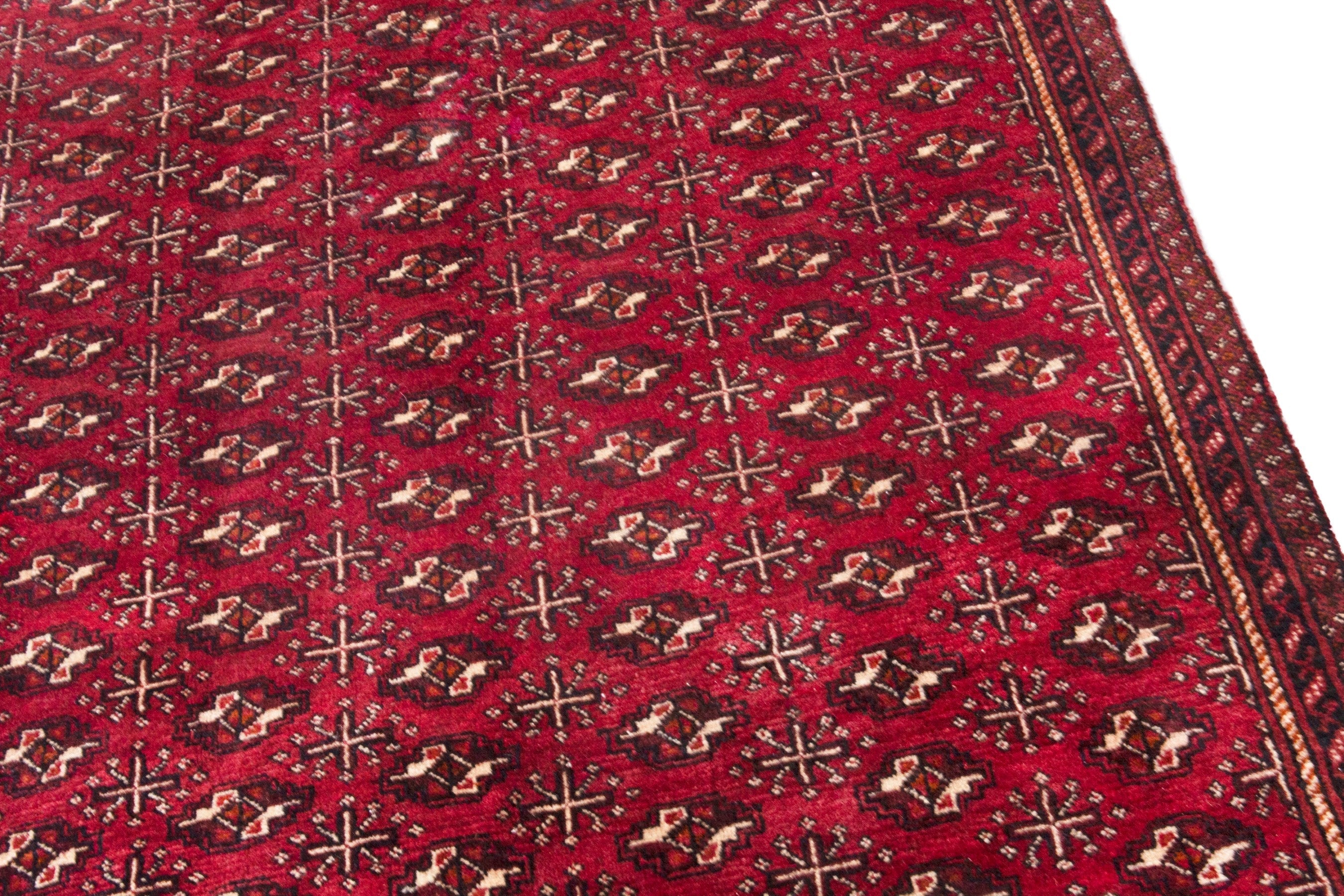 Persian Torkaman area rug in burgundy and deep red, view 7 of 21